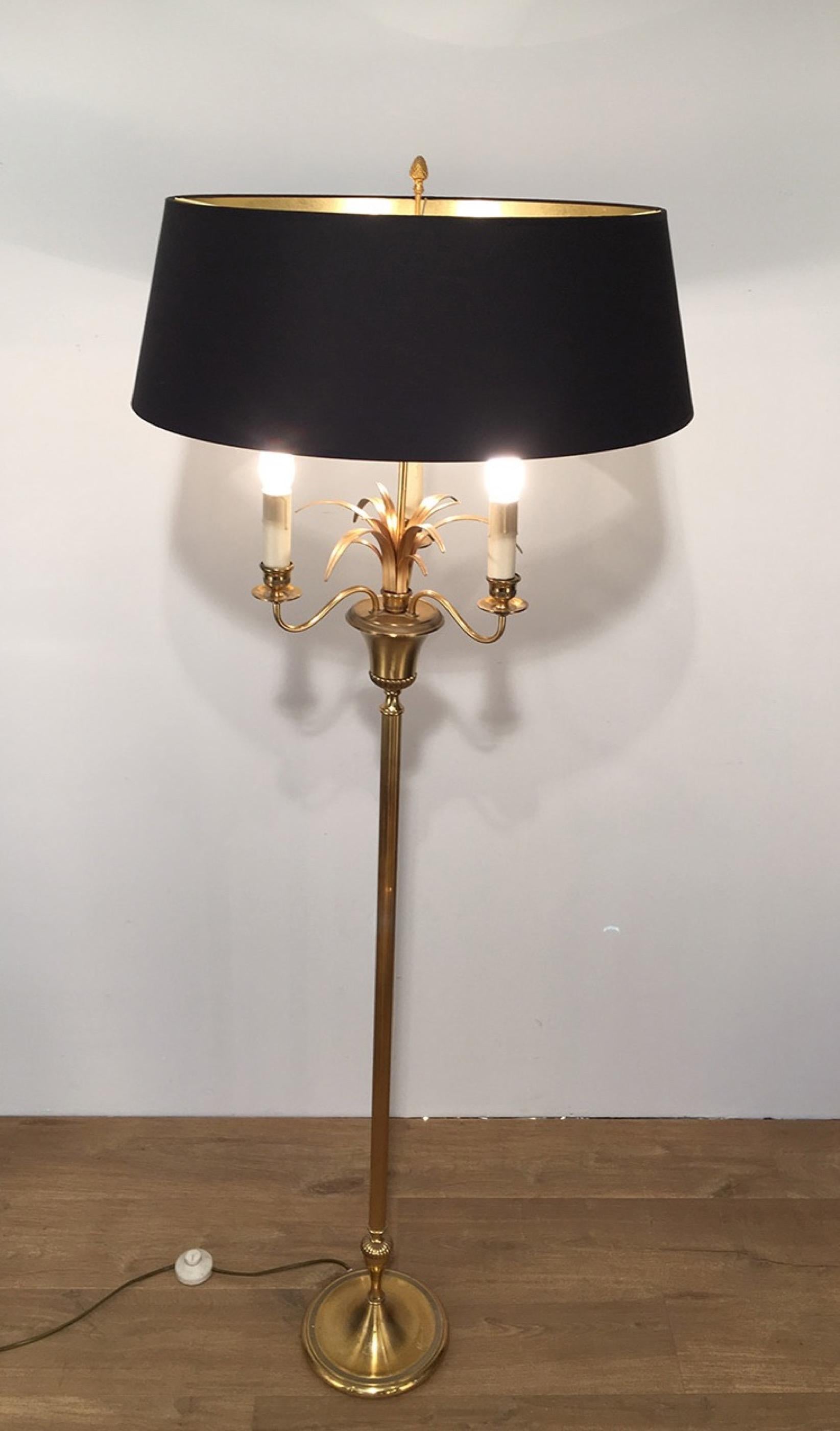 This pineapple floor lamp is made of brass and gilt metal with a black shintz shade, gilt inside. This is a very decorative floor lamp, in the style of famous French designer and maker Maison Charles, circa 1960.