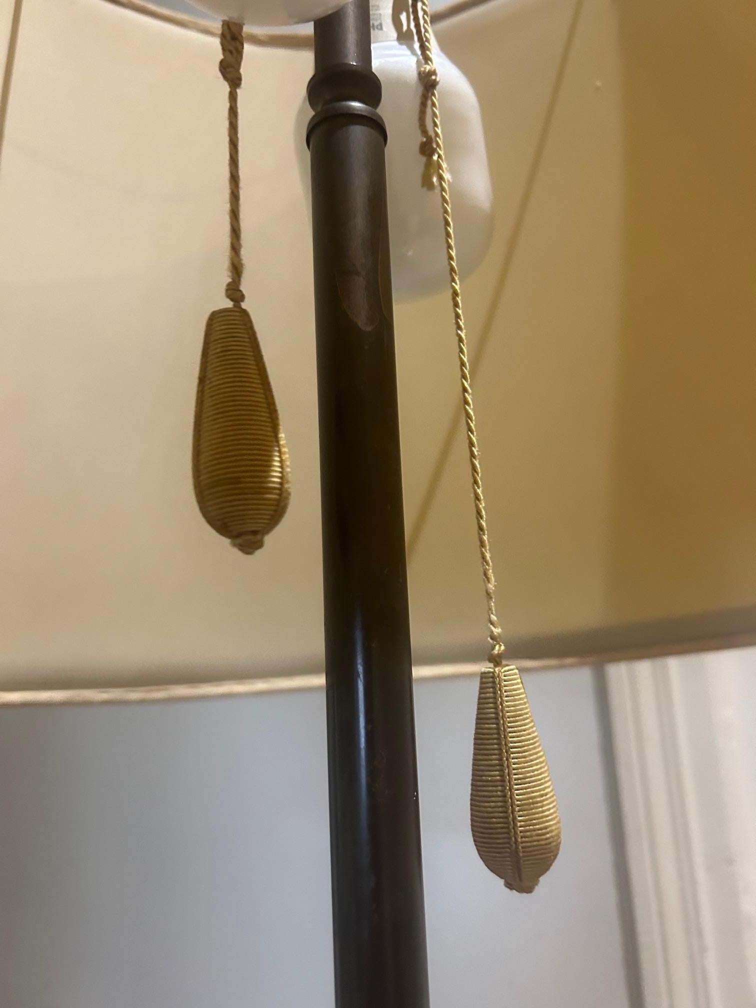 Brass neoclassical brass floor lamp attributed to Bagues For Sale