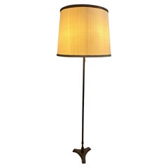 neoclassical brass floor lamp attributed to Bagues