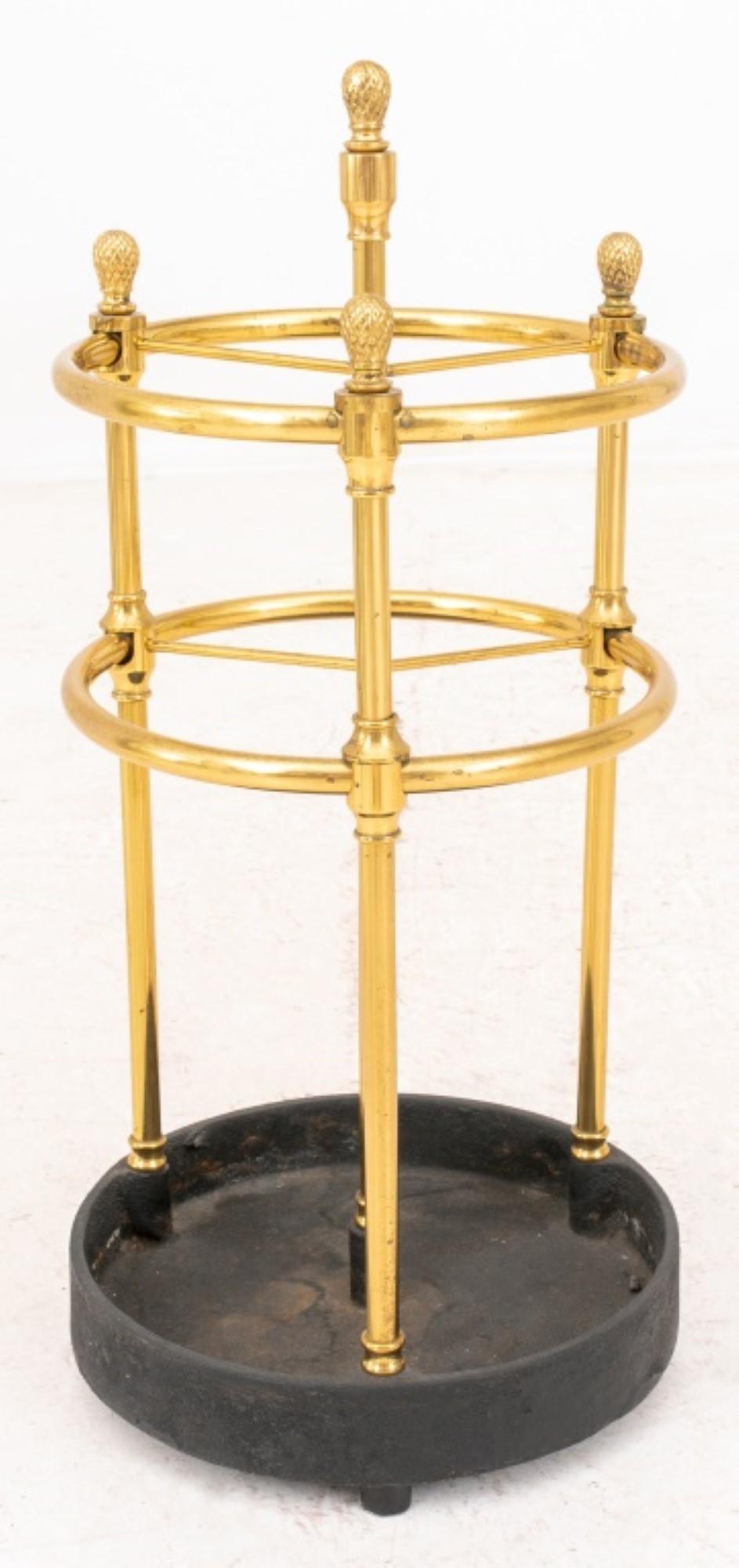 The Neoclassical brass umbrella stand or cane rack has approximate

 Dimensions of 25.5 inches in height and a diameter of 12 inches.
