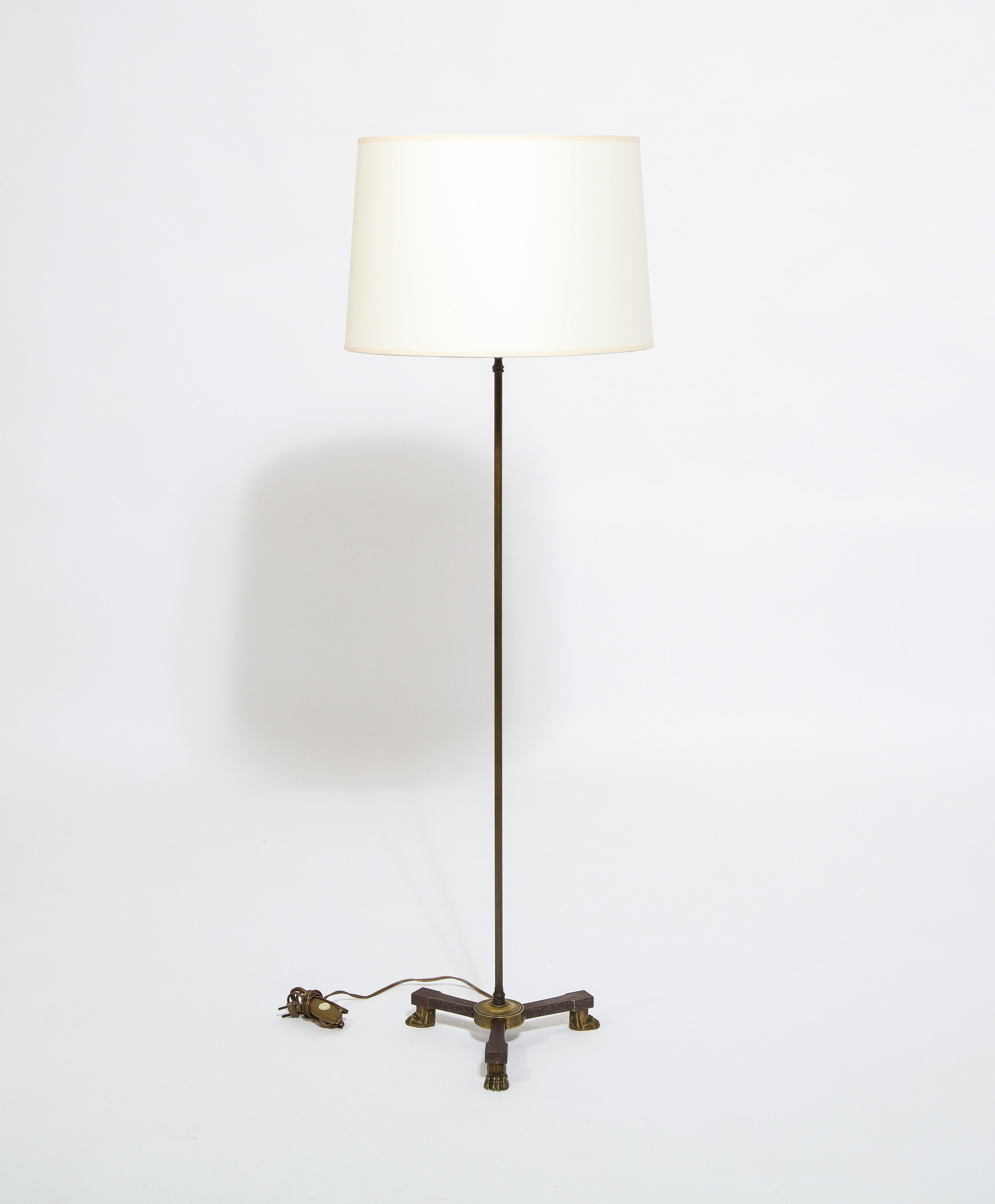 Bronze neoclassical tripod floor lamp by André Arbus. Lion feet decor.
Height can be adjusted from 45