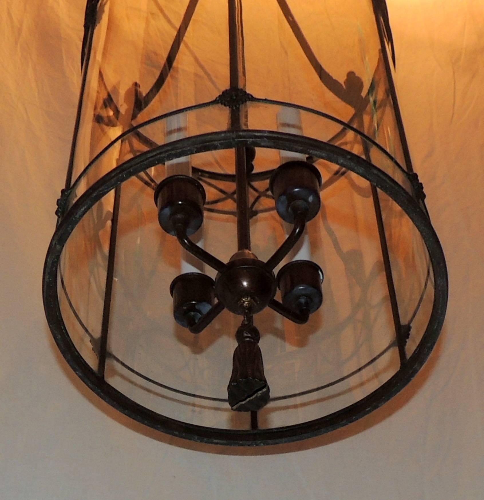 Bronze Panel Round Bent Glass Lantern Four-Light Caldwell Urn Fixture In Good Condition For Sale In Roslyn, NY