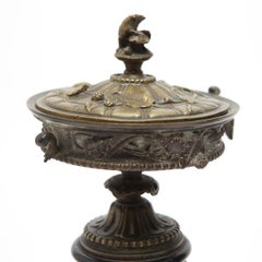 Neoclassical Bronze Tazza Urns with Lids on Black Marble Plinths