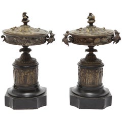Neoclassical Bronze Tazza Urns with Lids on Black Marble Plinths