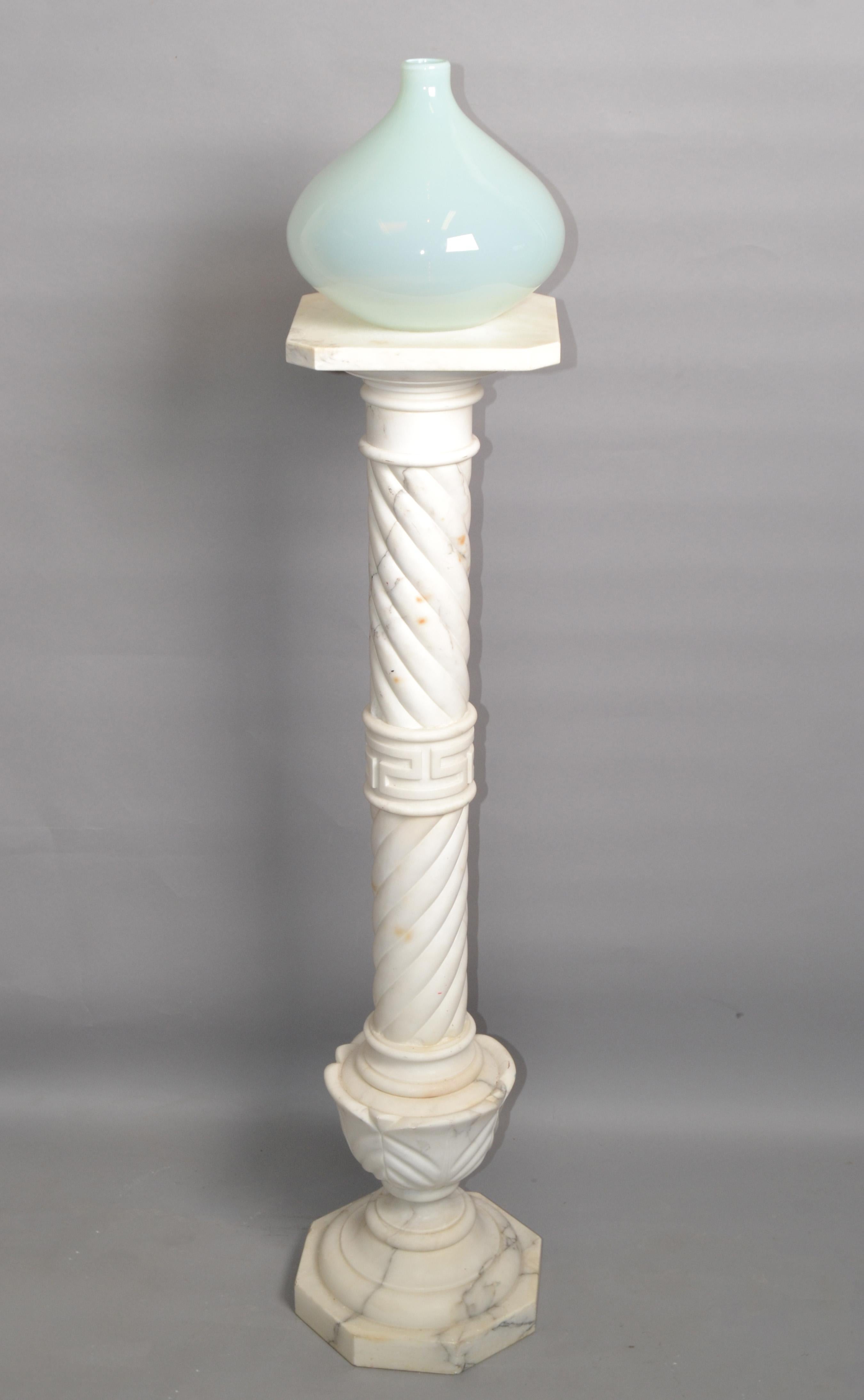 Elegant Carrara marble pedestal table, stand, column from Italy made in circa 1950. 
Hand carved with attention to detail and Greek Key Decor.
This will be a Perfect Stand for Art Deco Sculptures and Statues. 
Giving of an Instant Classy