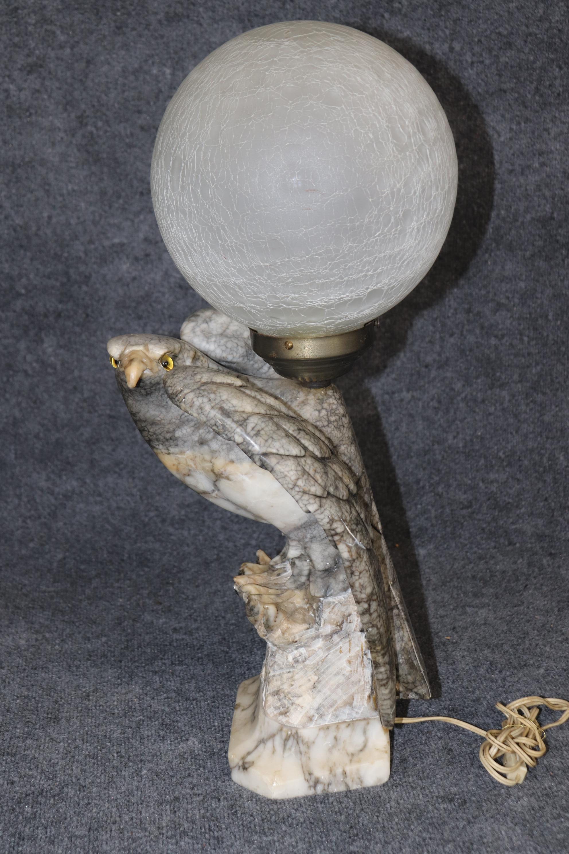 Dimensions- H: 25in W: 13 1/4in D: 10 3/4in 

This vintage Neoclassical style carved alabaster eagle lamp is truly unique and crafted of the highest quality! This is perfect for any living room, bedroom, entryway, kitchen or office and is bound to