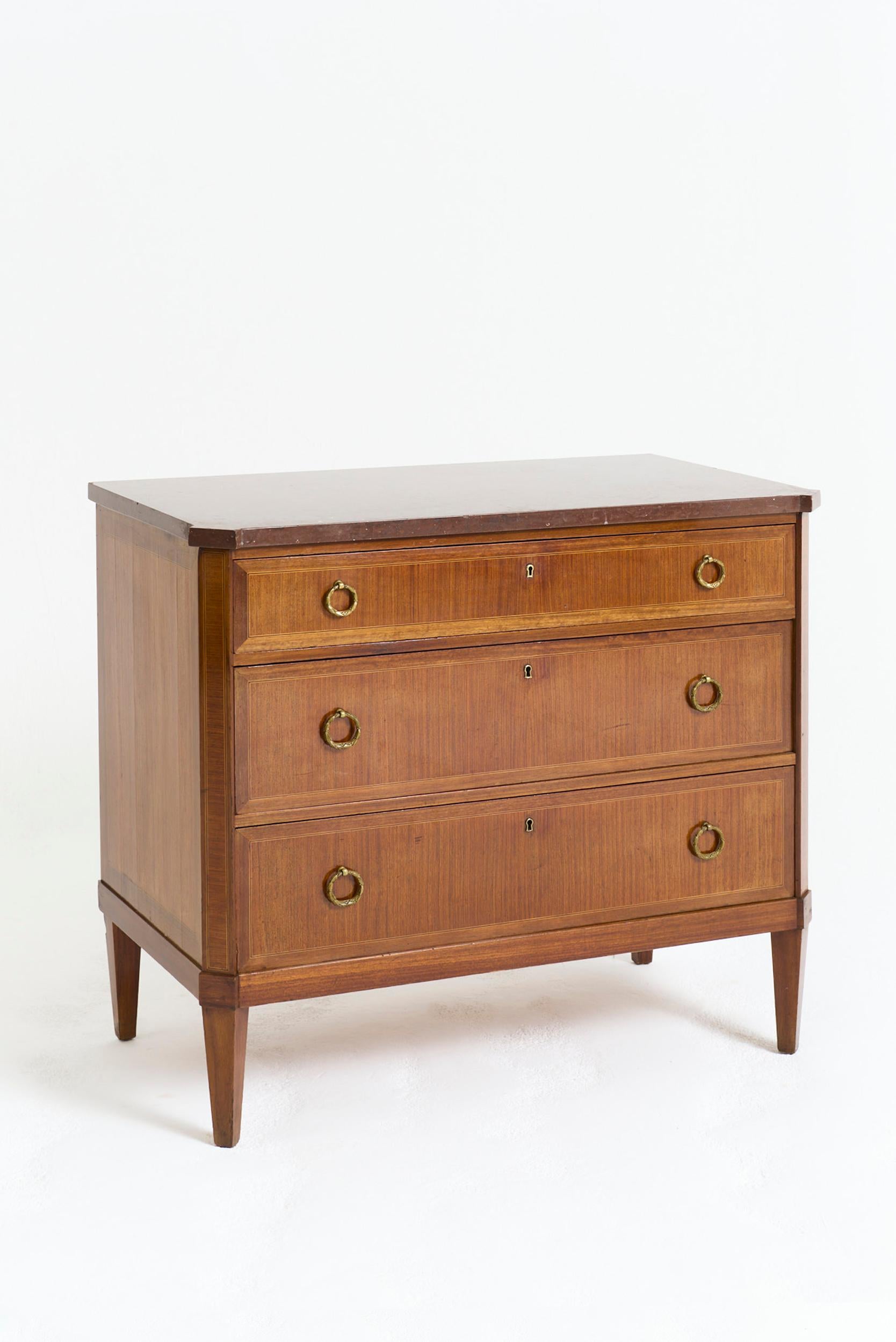 A Neoclassical marble top mahogany and brass mounts chest of drawers
Sweden, Circa 1880
