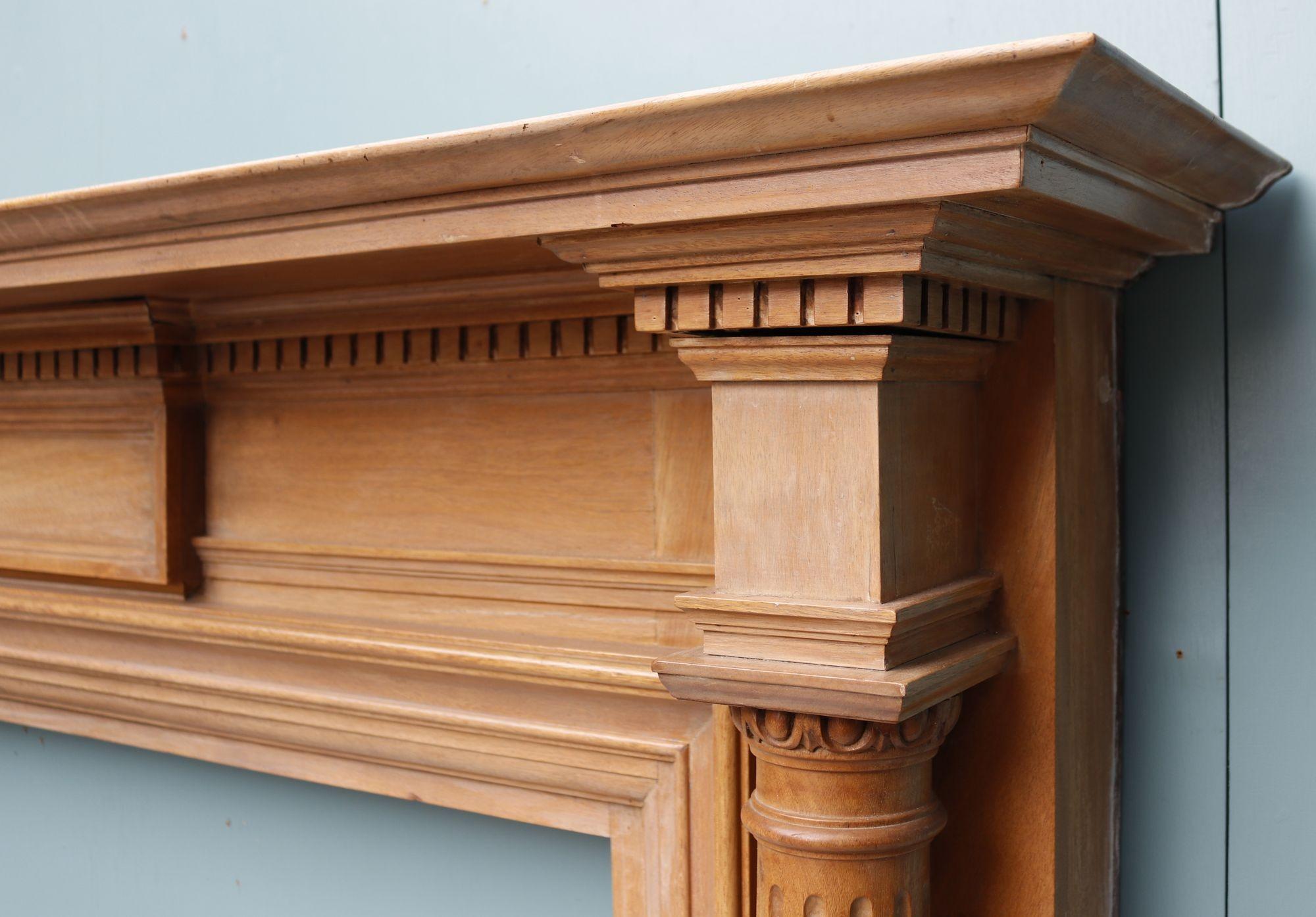 Neoclassical Columned Timber Fireplace. A neoclassical style fireplace with dental carvings along the frieze. There are two columns either side of the jambs which give the piece a grand appearance.
 
Additional Dimensions


Opening height: 100