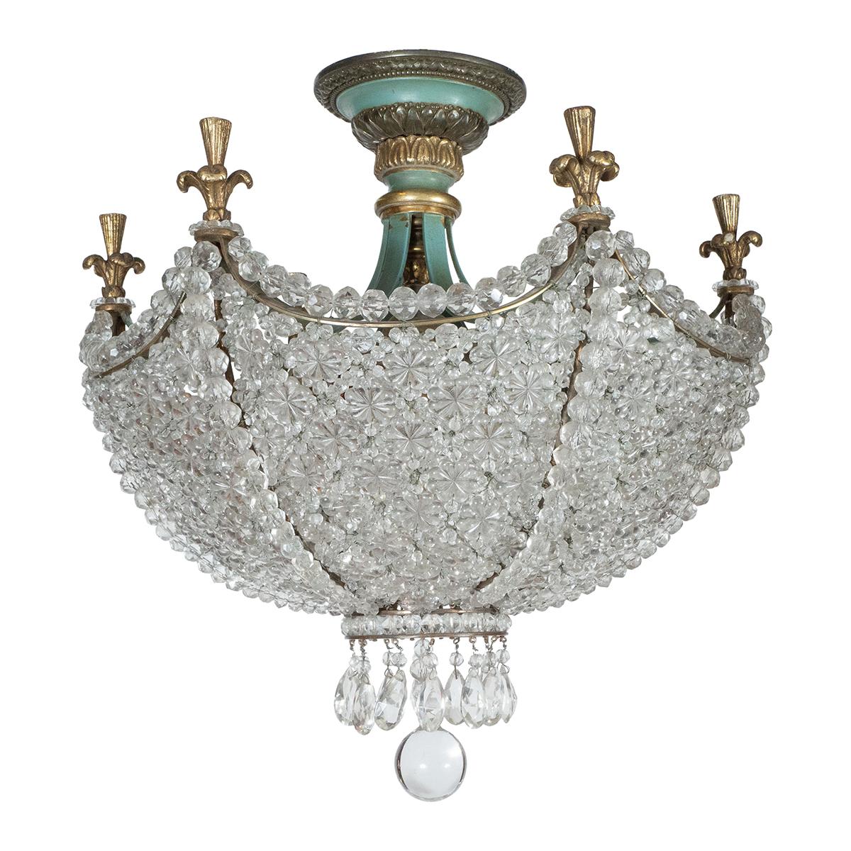 Intricately beaded flush mount fixture with painted metal frame, fleur finial details and  