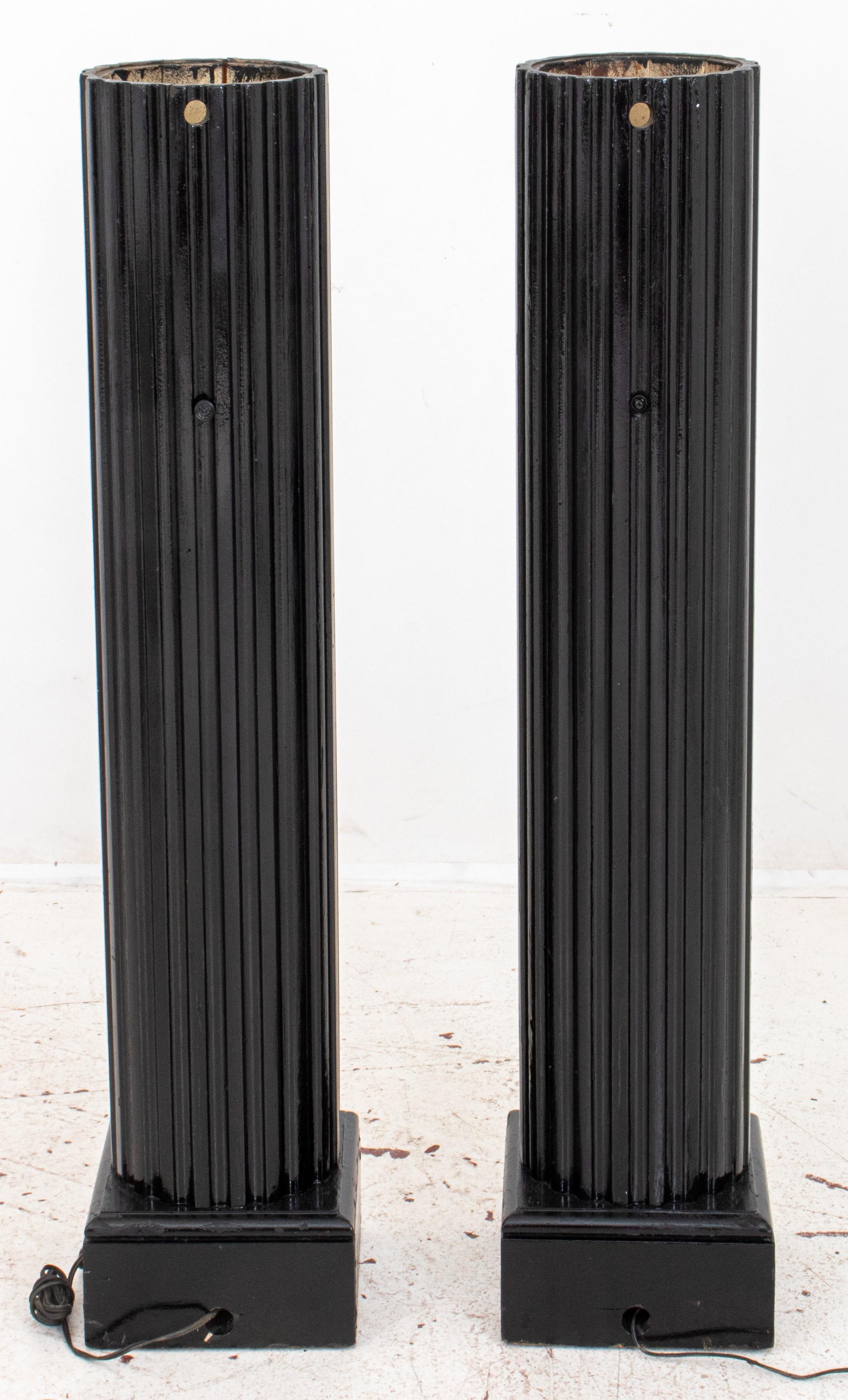 neoclassical ebonized fluted wood pedestal column lamps. Here are the details:

Style: Neoclassical
Material: Ebonized fluted wood
Features:
Pedestal column design
Original 