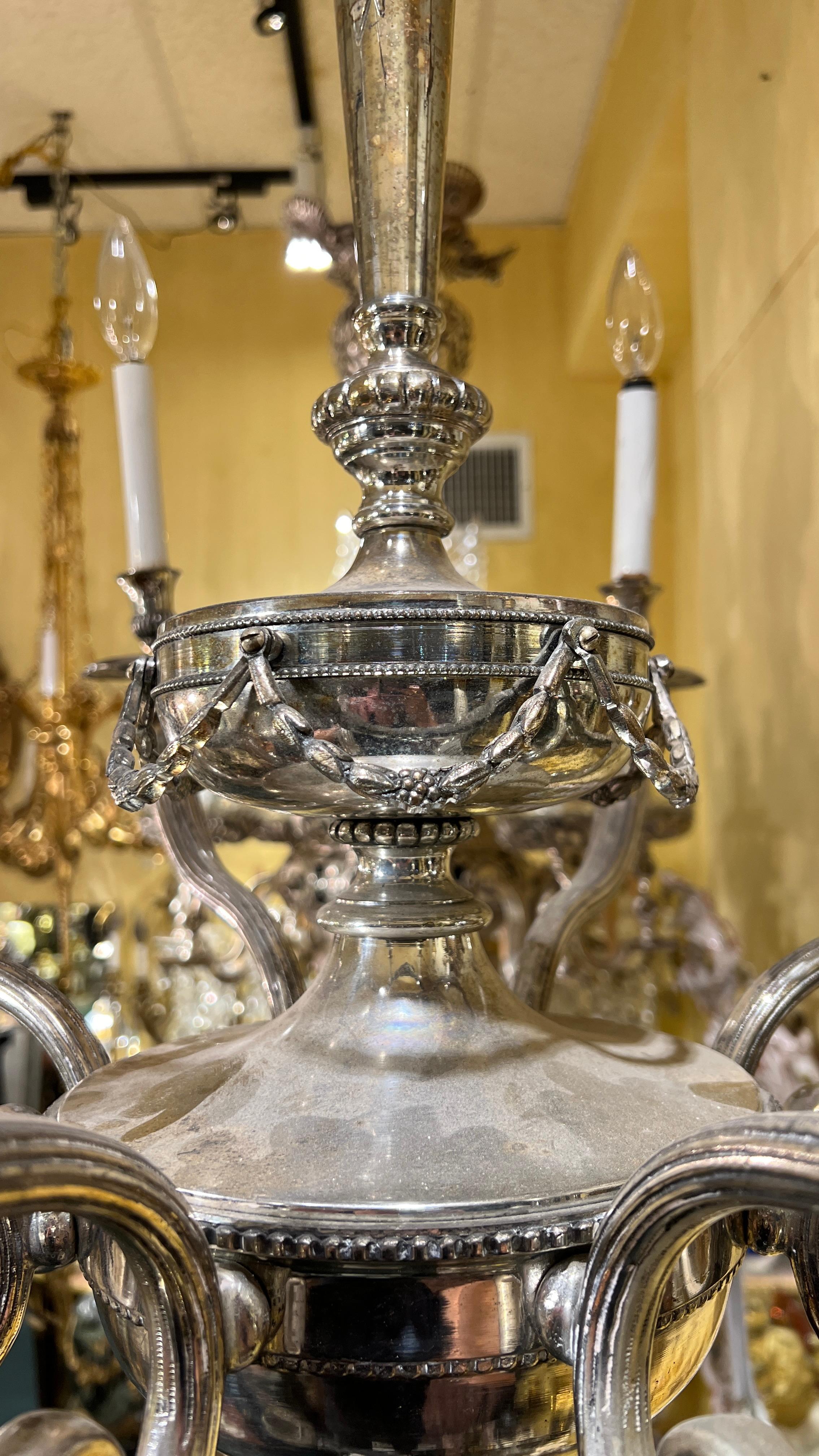 20th Century Neoclassical Silvered 8-Light Chandelier Attributed to Caldwell and Co. For Sale