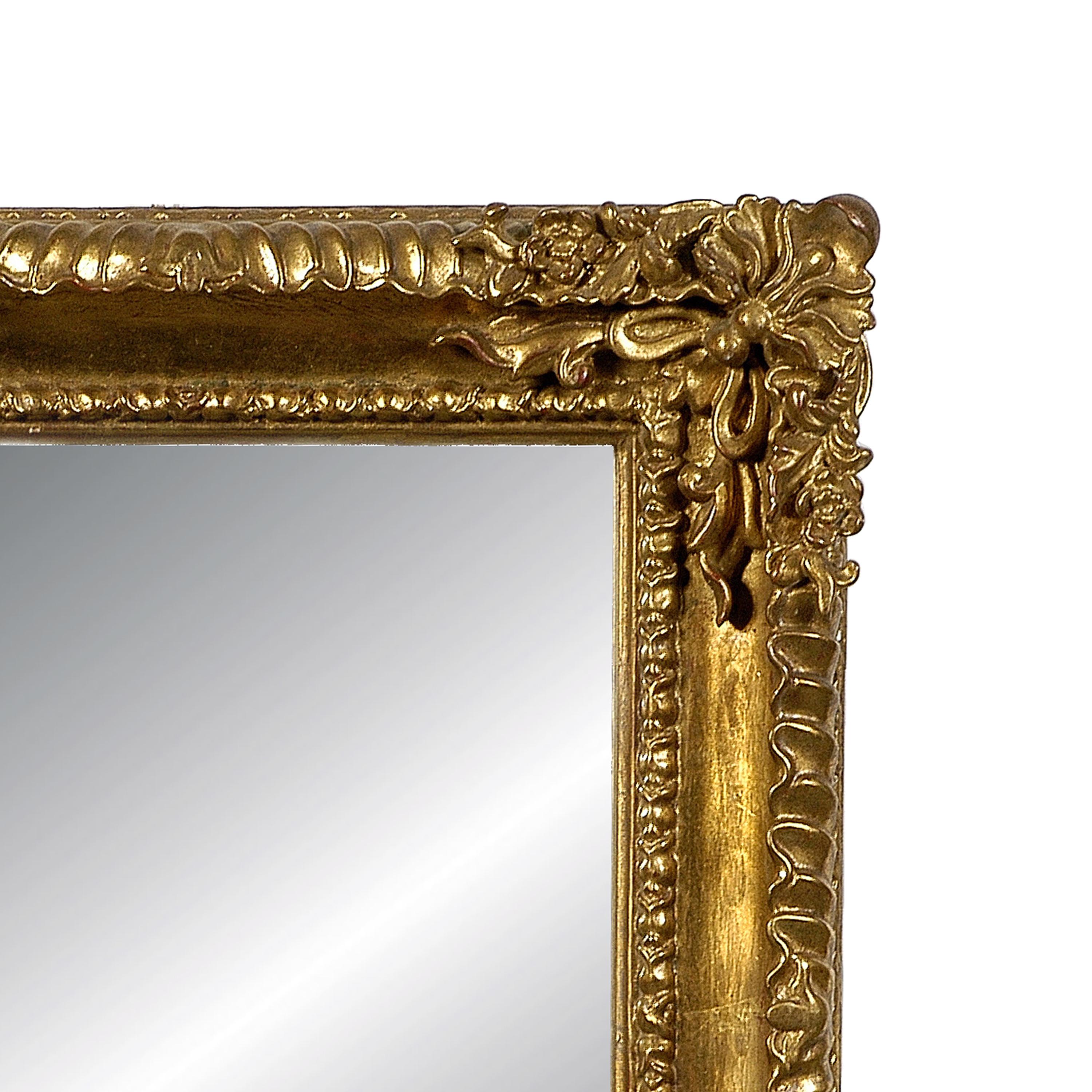 Neoclassical Empire rectangular handcrafted mirror. Rectangular hand carved wooden structure with gold foil finished, Spain, 1970.