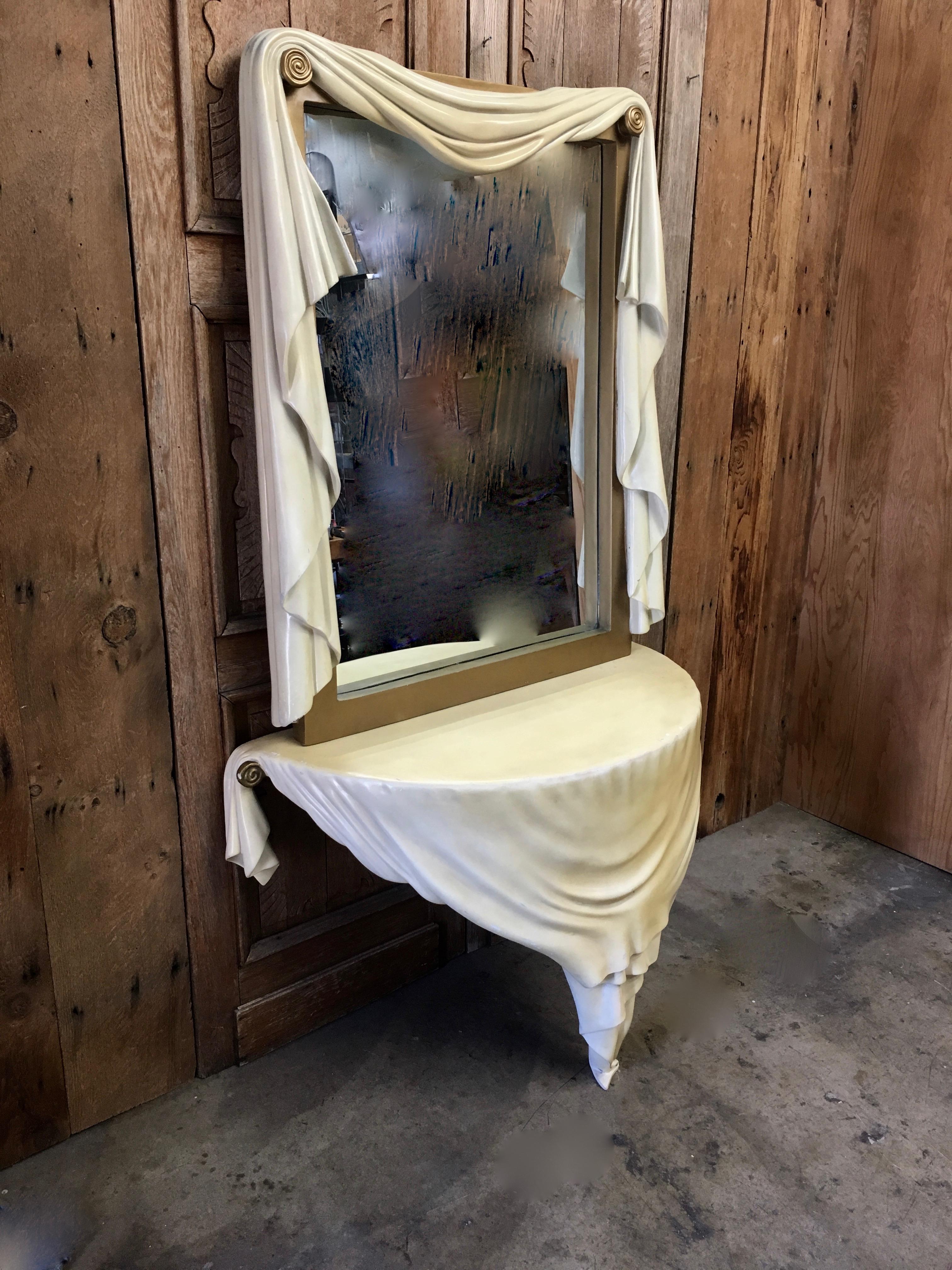 This Antique style surreal fantasy piece is made of fiberglass, that the table mounts to the wall and the mirror can be hung above the table or simply sit on top the table.