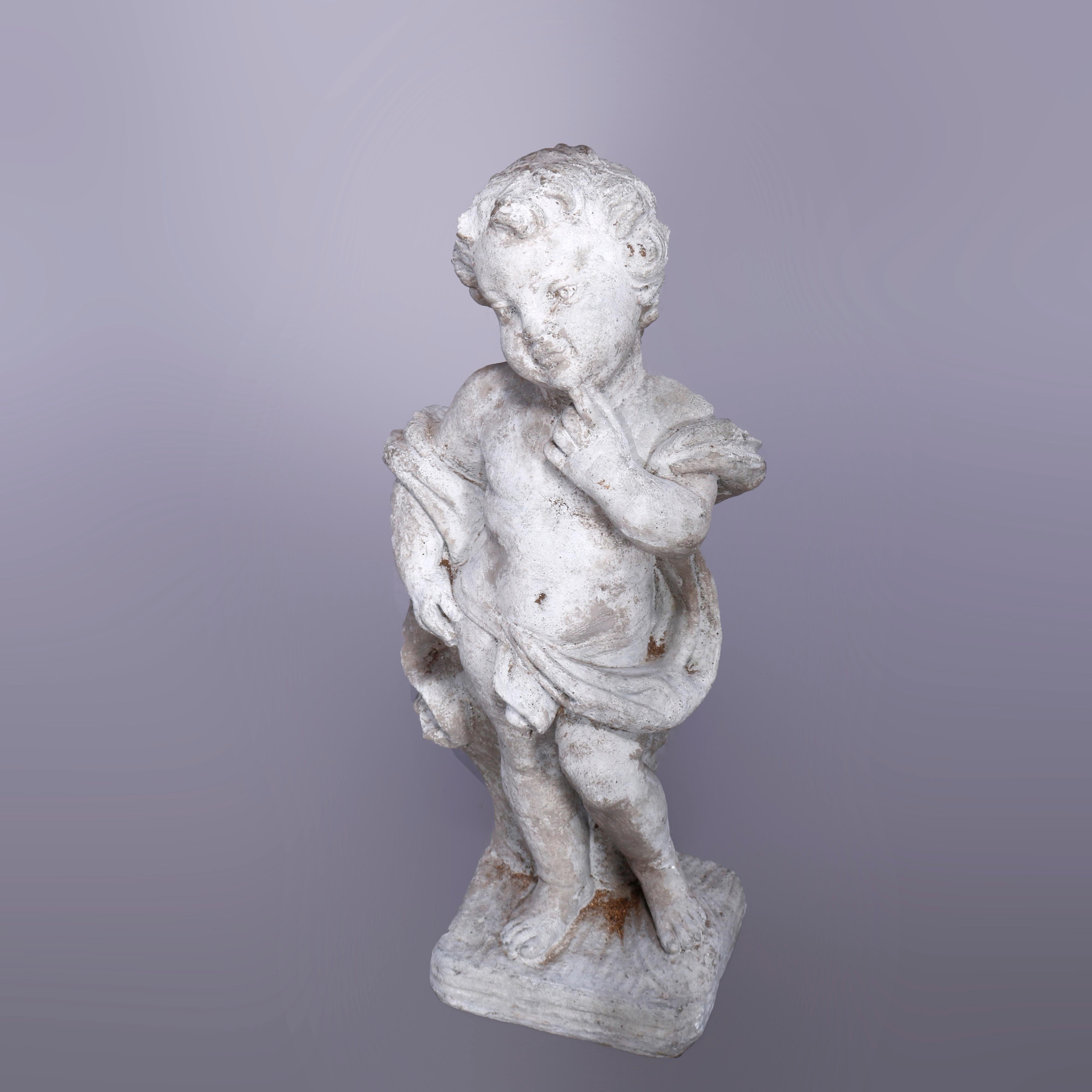 A neoclassical figural garden sculpture offers cast hard stone statue of a cherub deep in thought in countryside setting, 20th century

Measures - 24'' H x 9.5'' W x 9.5'' D.
