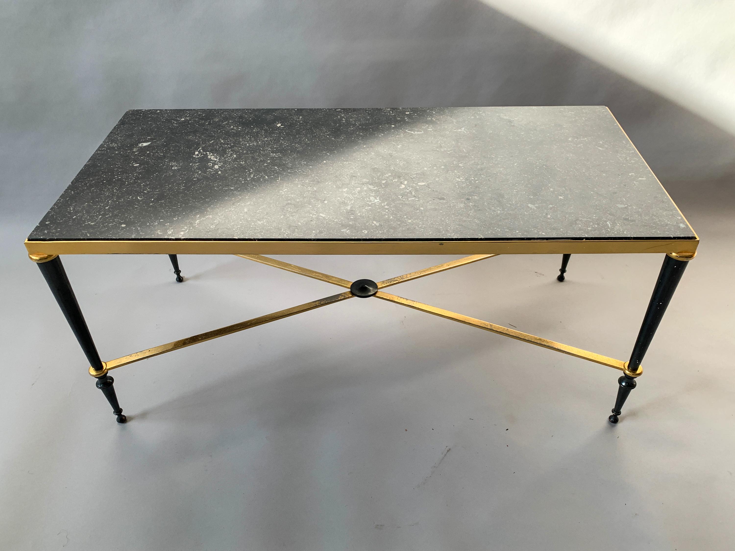 1940s neoclassical style, brass-plated coffee table with beautiful black marble top attributed to Jules Leleu. Great patination to brass 