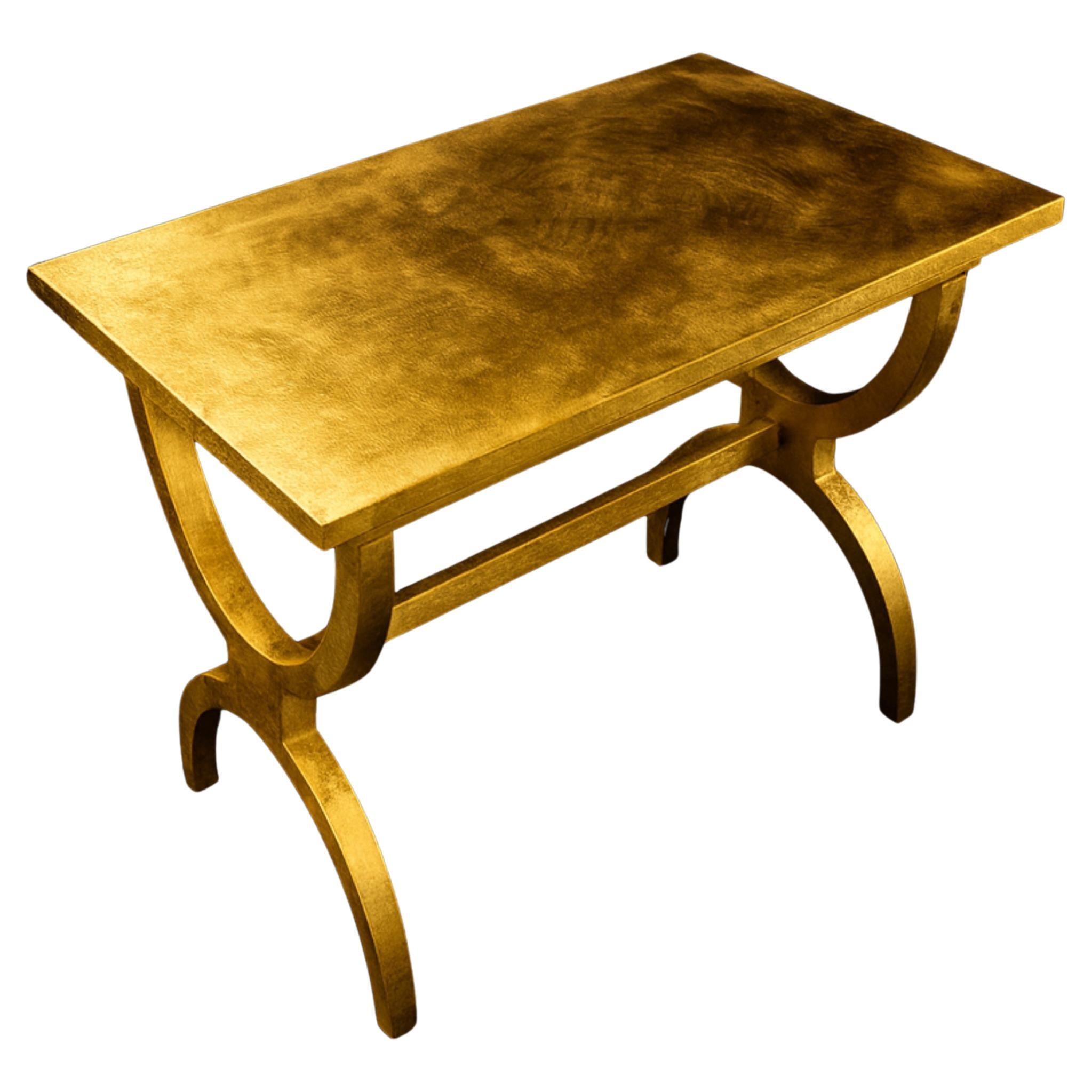  Featuring elegantly curved legs and a sophisticated gilt finish, this timeless piece seamlessly blends modern and classic decor styles. Crafted with exquisite craftsmanship, it is a versatile and enduring addition to any interior, embodying both