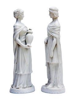 Neoclassical German White Bisque Figurines; a pair.