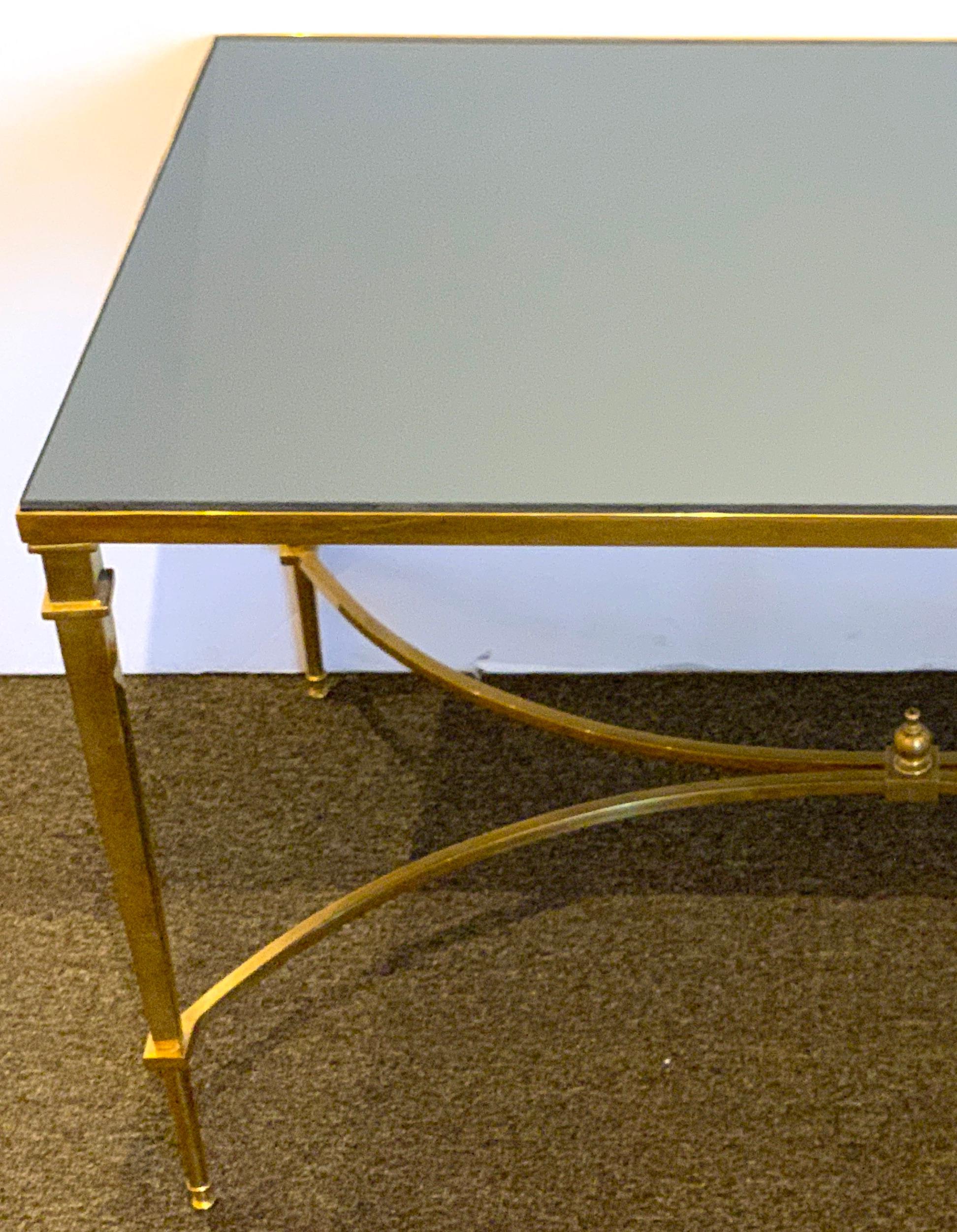 Neoclassical gilt bronze coffee table with grey mirror top, beautiful subtle casting, with removable steel grey mirror top.