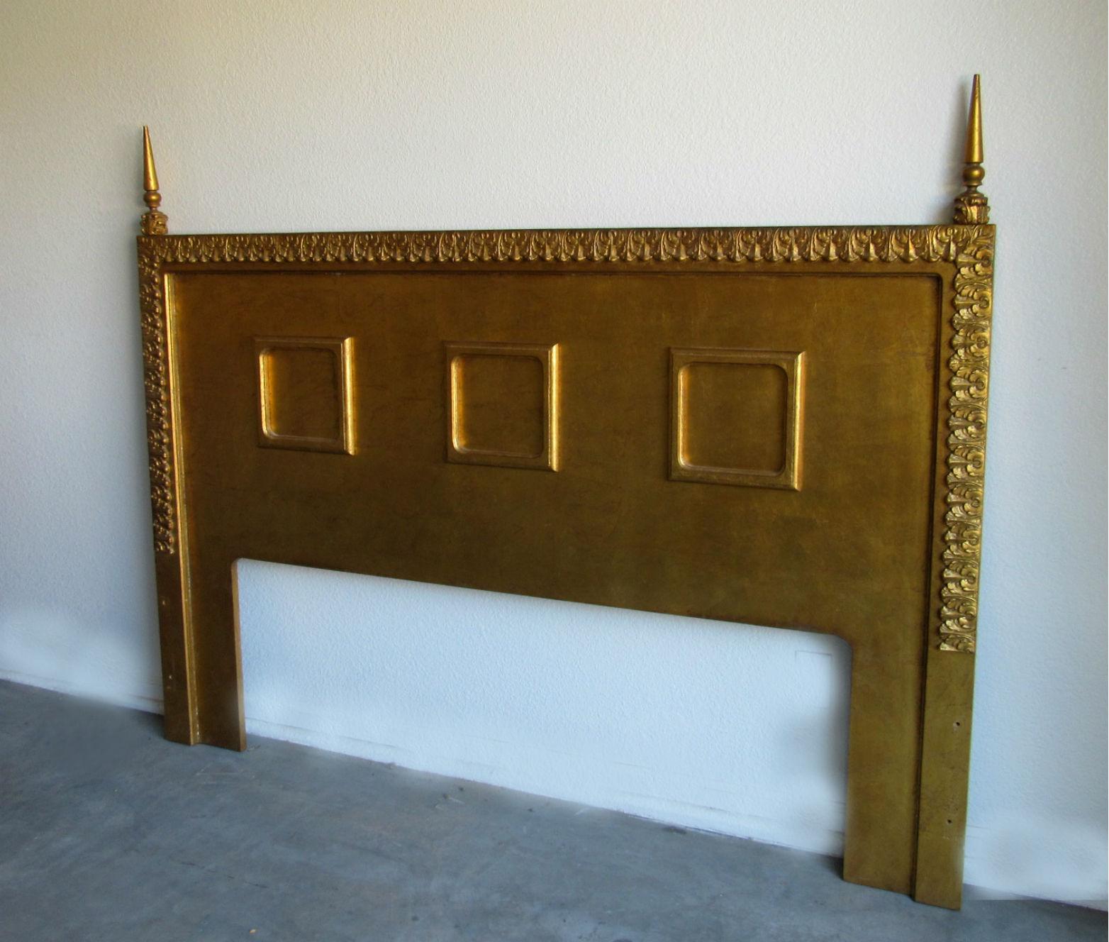 Neoclassical gilt king size headboard, circa the 1960s. Designed and manufactured by David Zeren of California in the 1960s, this king-size headboard carved of mahogany and covered in gold leaf.