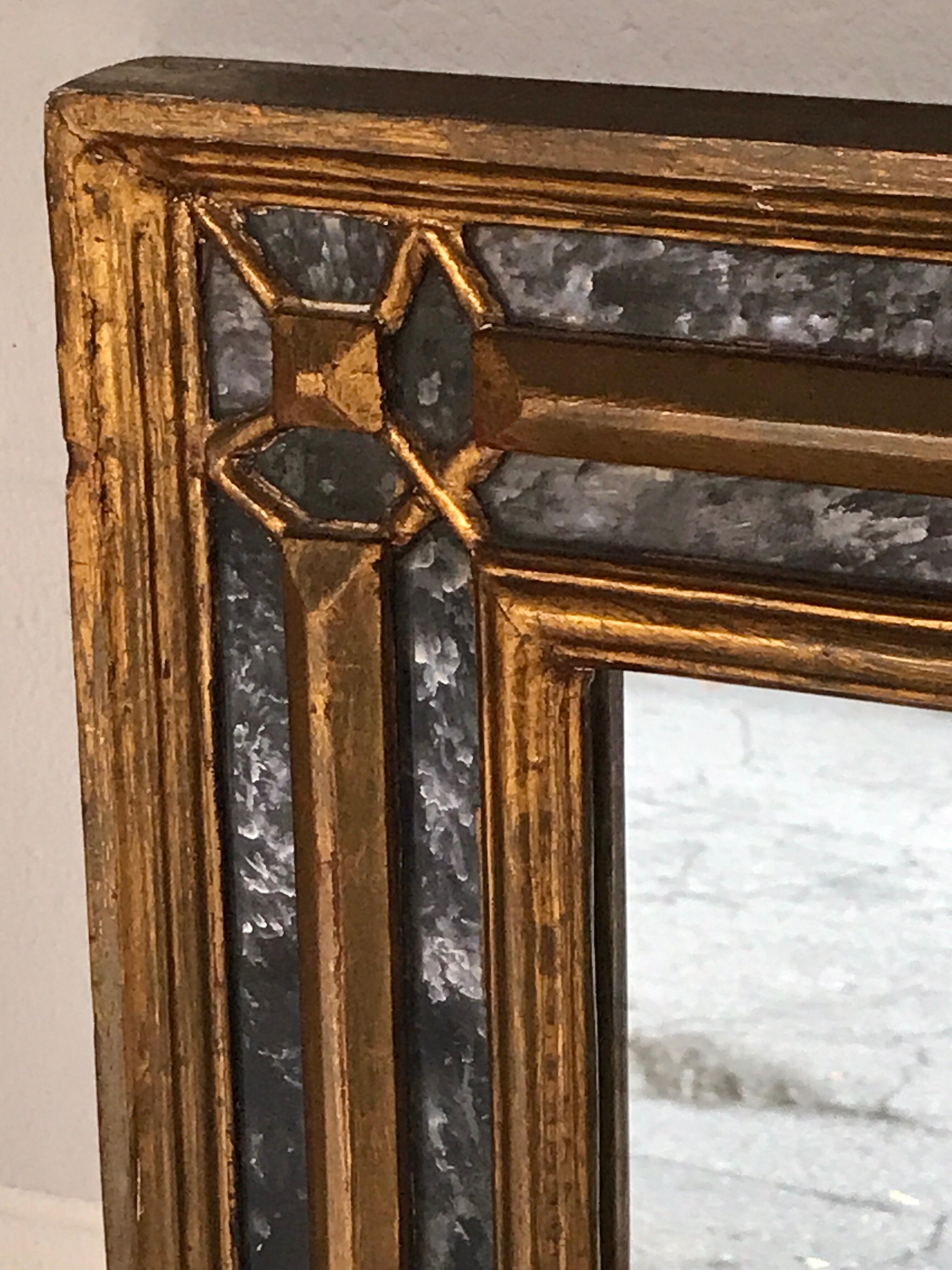 Carved Neoclassical Giltwood Églomisé Mirror