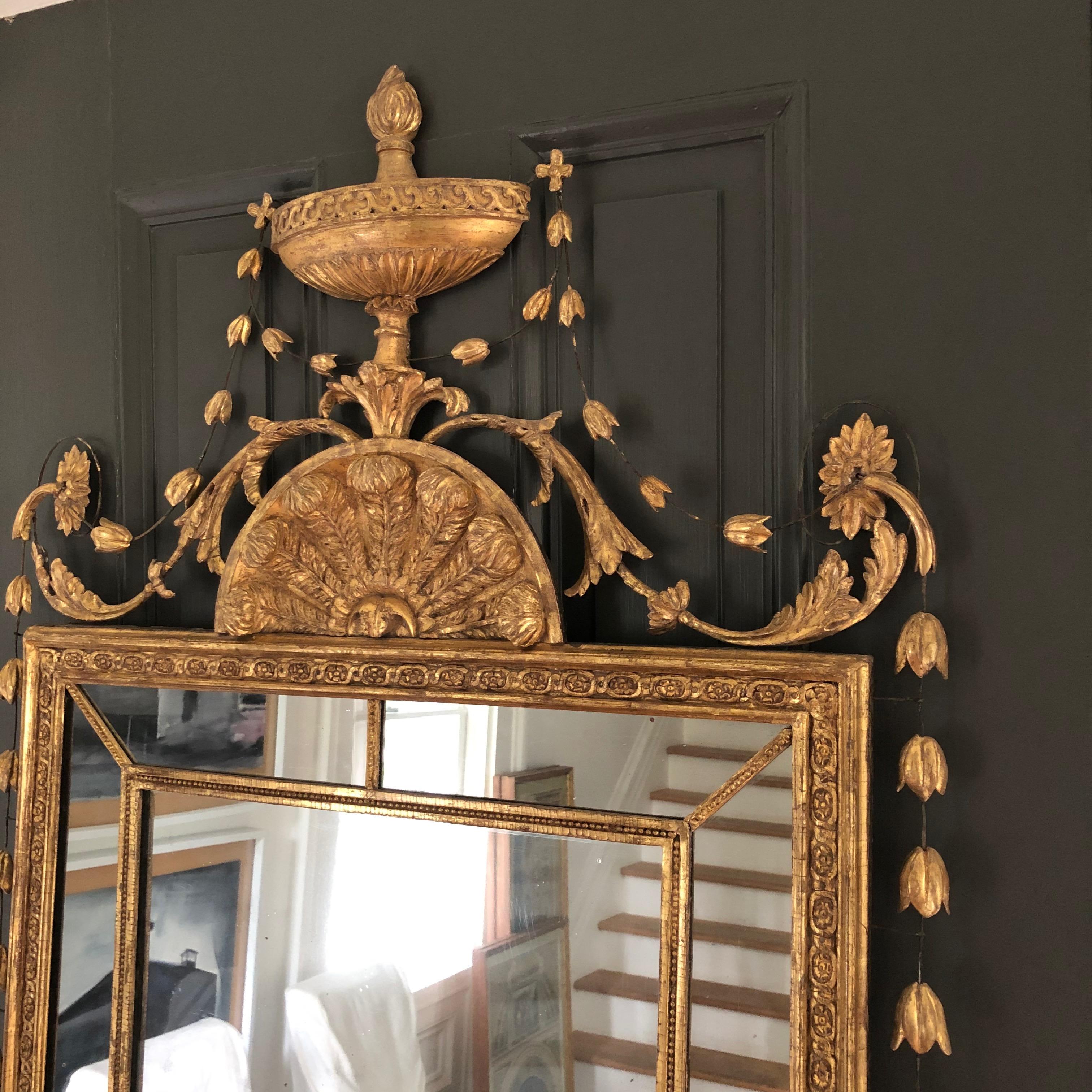 Neoclassical giltwood pier mirror English, circa 1770
Measures: Height 81 in., width 32 1/2 in.
2228.