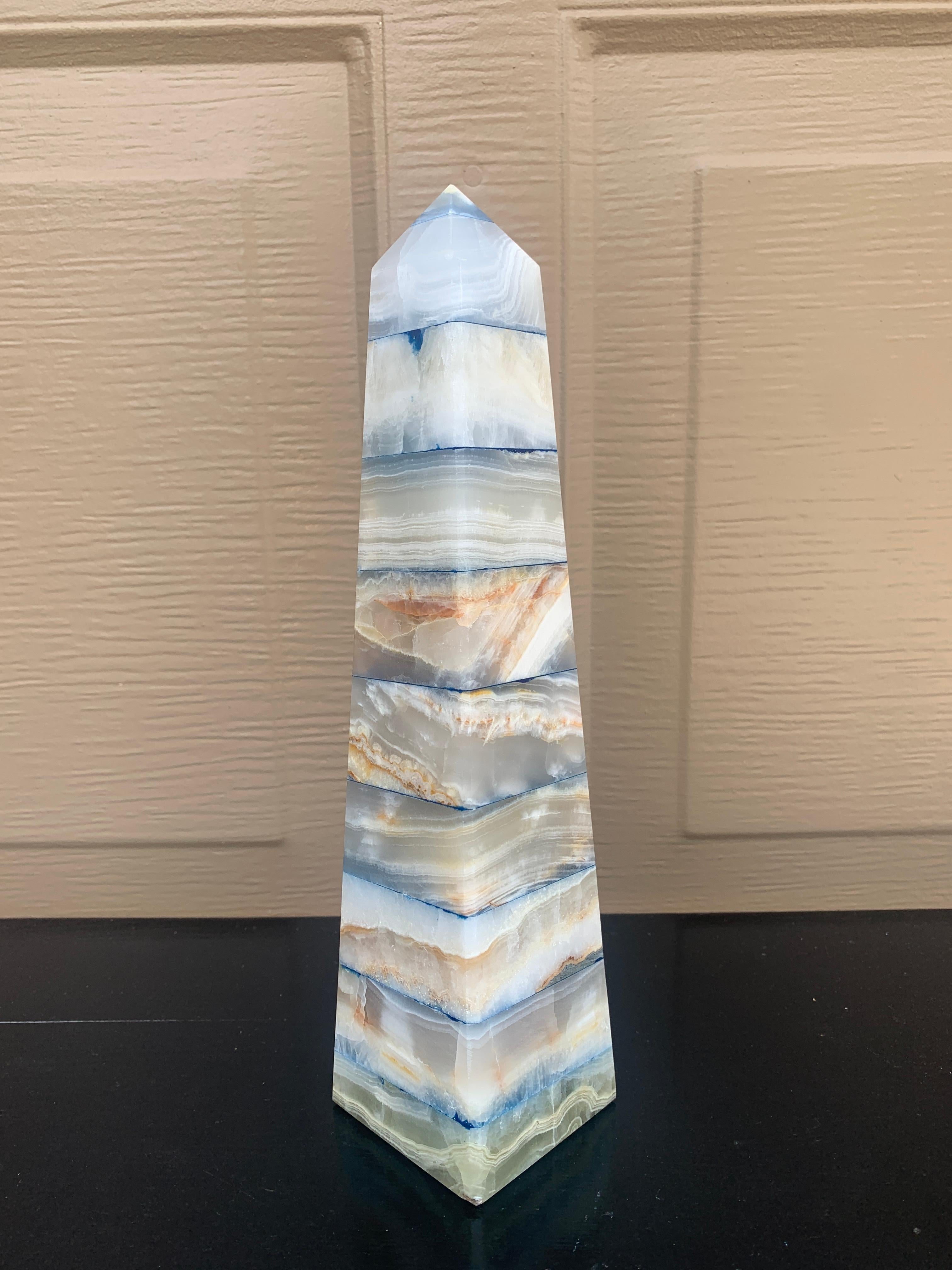 A stunning neoclassical or Grand Tour style solid marble blue, tan, and white obelisk

Measures: 2.5