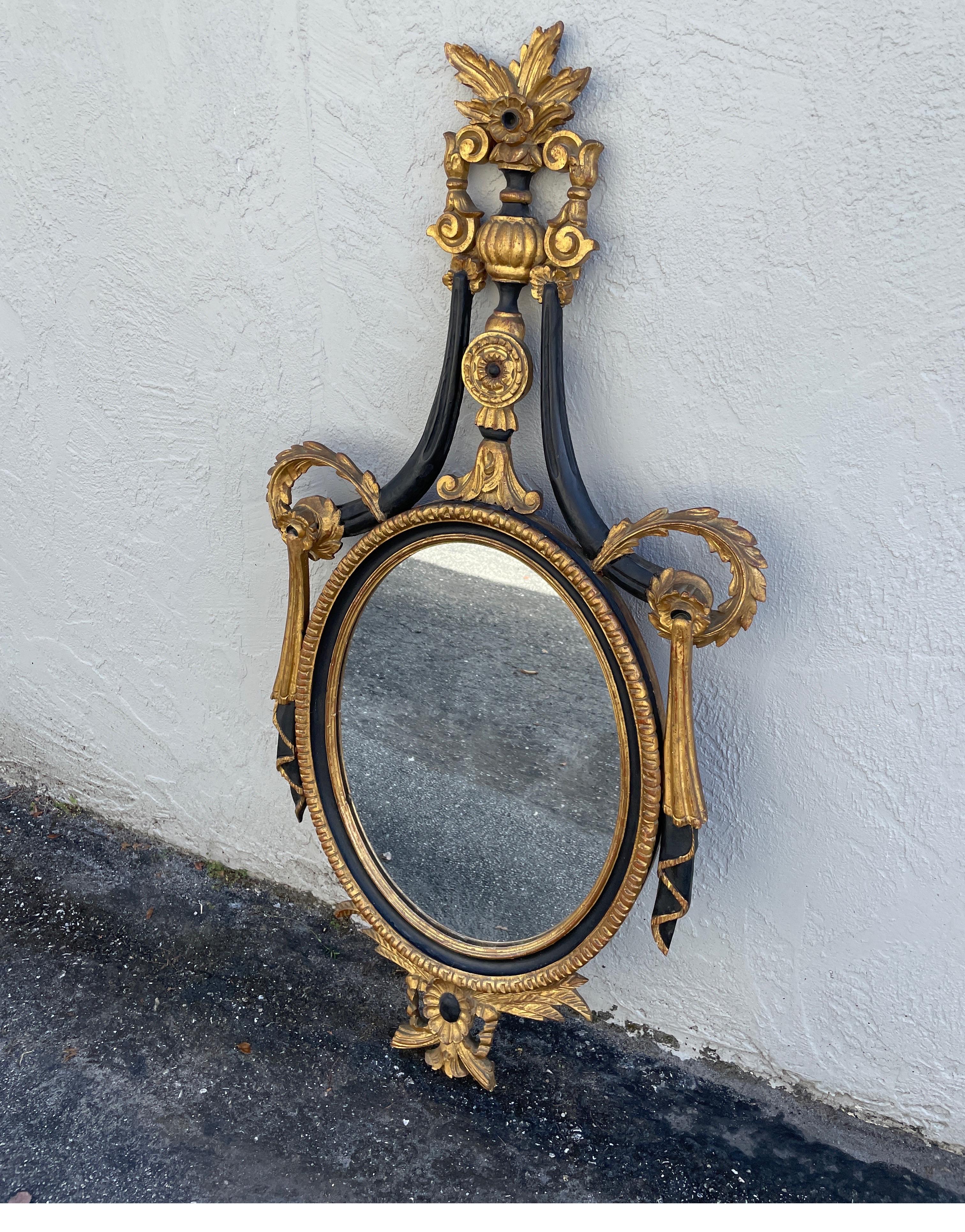 Hand carved, painted & gilded Swag mirror in the Neoclassical style by the Italian maker Palladio.