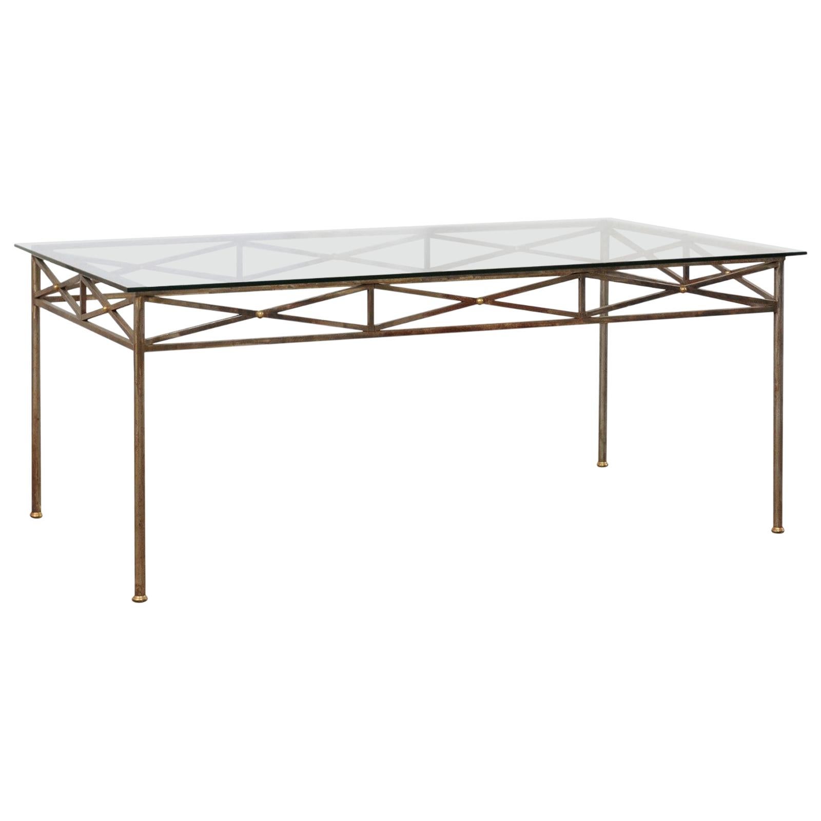 Neoclassical Inspired Metal Dining Table with Brass Accents and Glass Top