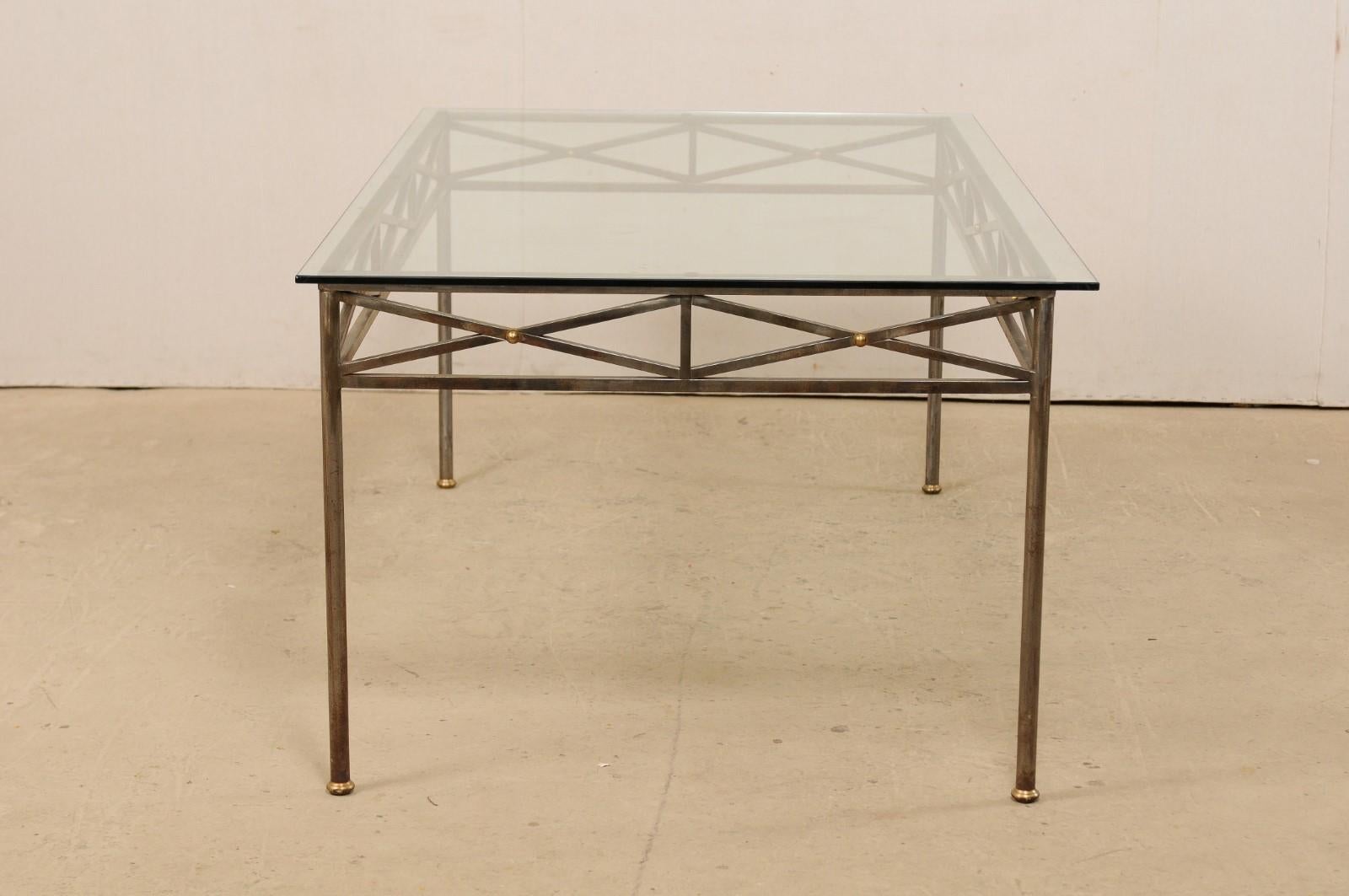 20th Century Neoclassical Inspired Metal Dining Table with Brass Accents and Glass Top For Sale