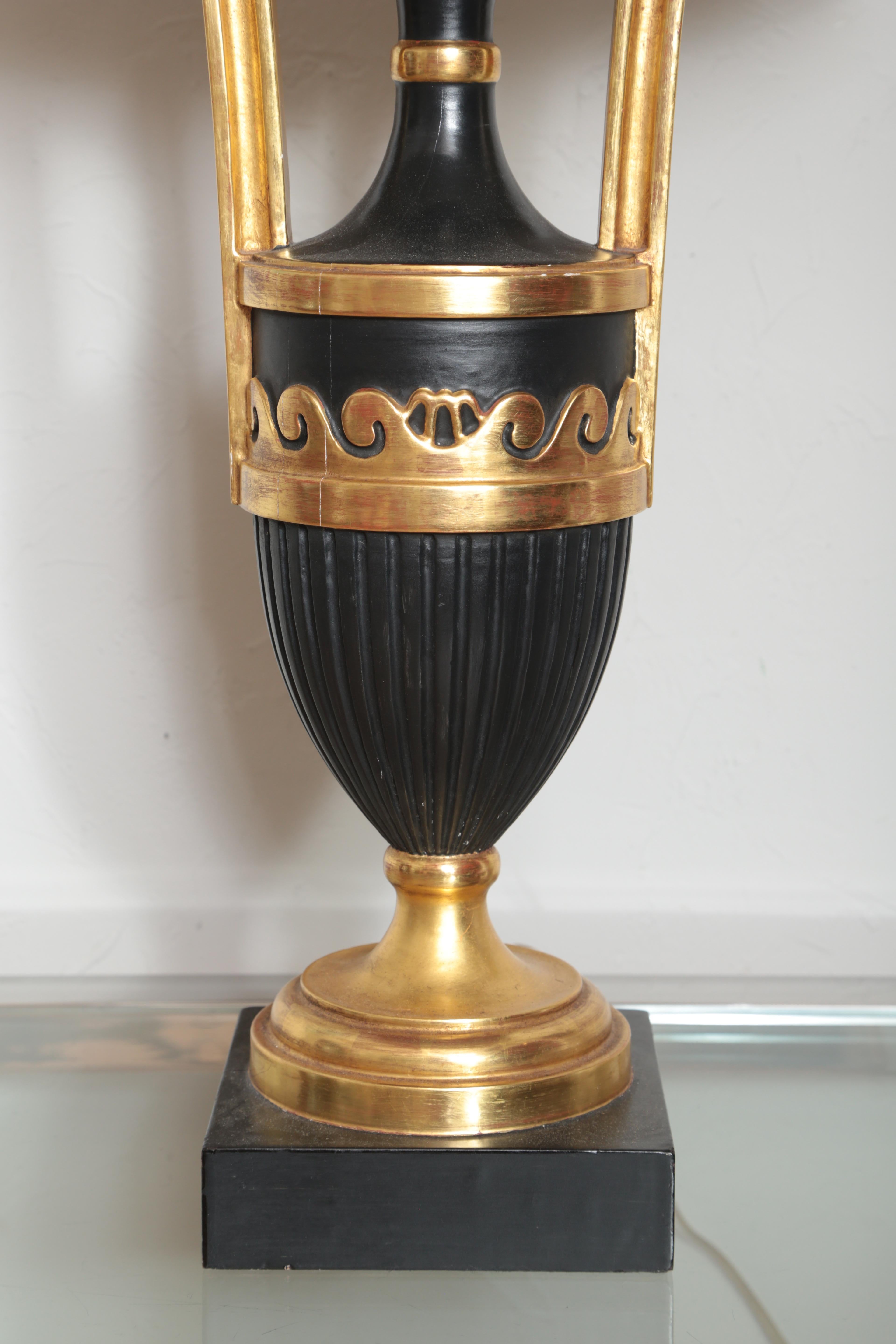 Italian carved, painted and gilded urn form lamp with new silk shade.