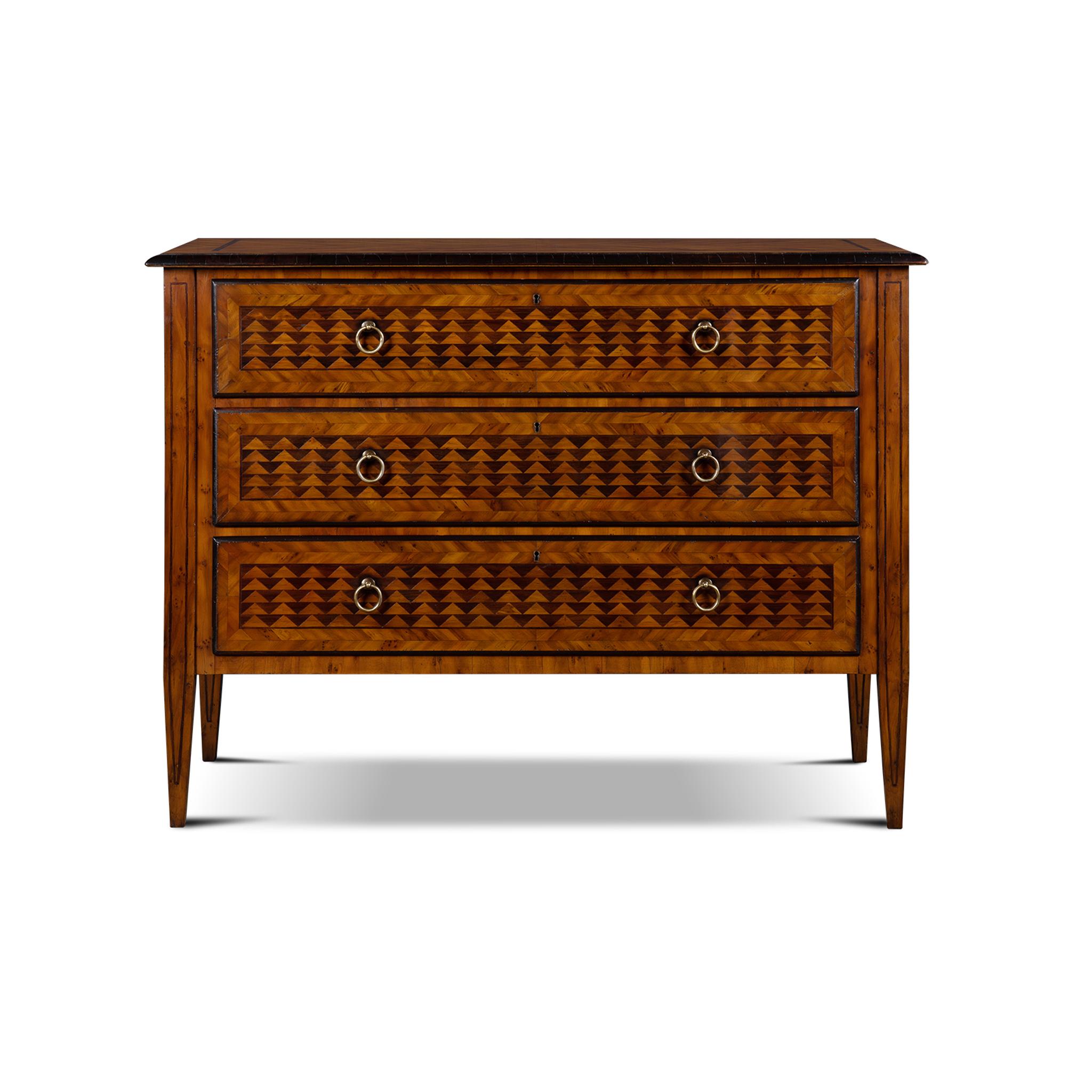 The Laon Chest is inspired in the Neoclassical Italian style. This is the perfect piece to accompany a classically styled environment and stand out amongst modern settings as a statement piece. With intricate marquetry made of dark and light