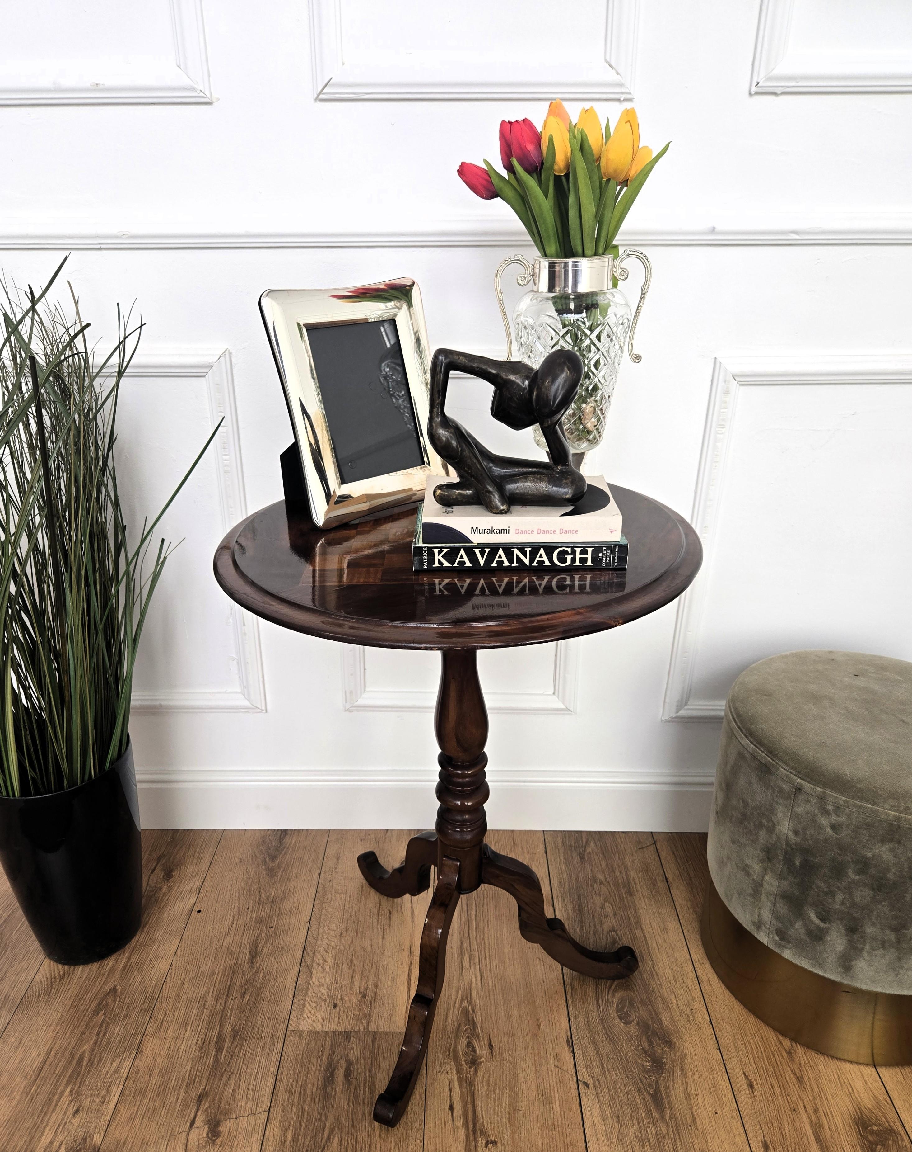 A beautiful Italian round walnut side table with great details and frames shaped in Victorian, Napoleon III, Louis XV style with chessboard on the top and the tripod feet legs. A very elegant, modern and classic piece that showcases the refined