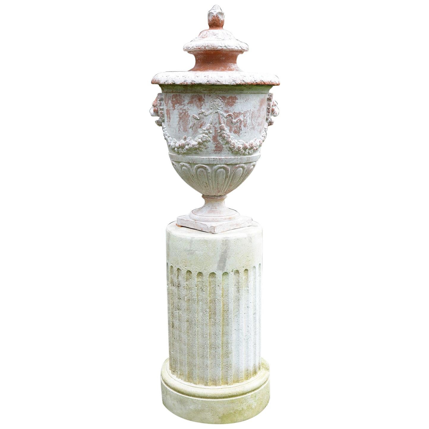 White Painted Terra-cotta Urn with Lid on White Stone Pedestal