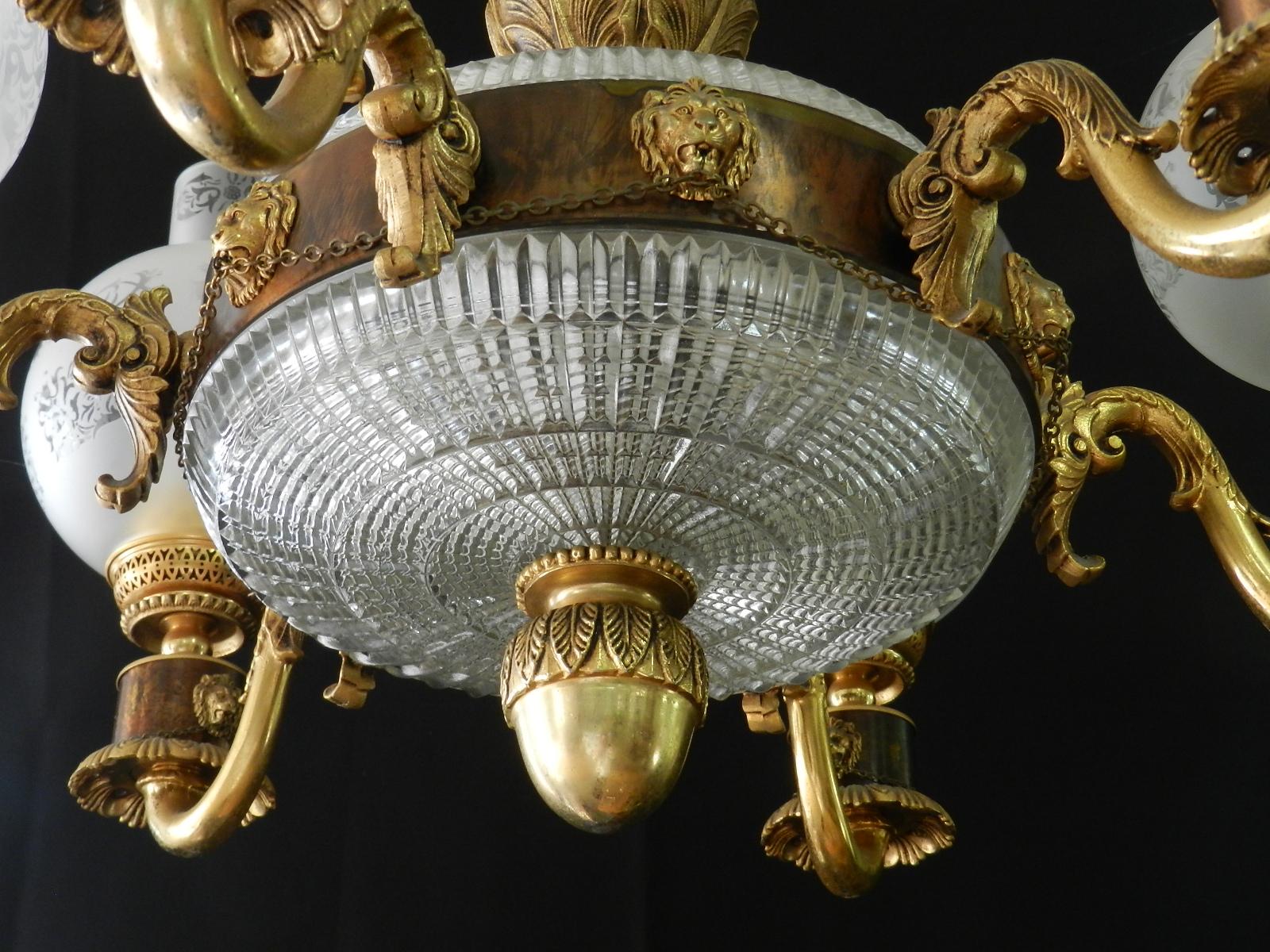 French neoclassical chandelier with lions head decoration superb quality attributed to Maison Baguès
Six arm chandelier with glass shades this being the largest from a set of 3 please see our other listings
Gilded Bronze
We are listing 2 other