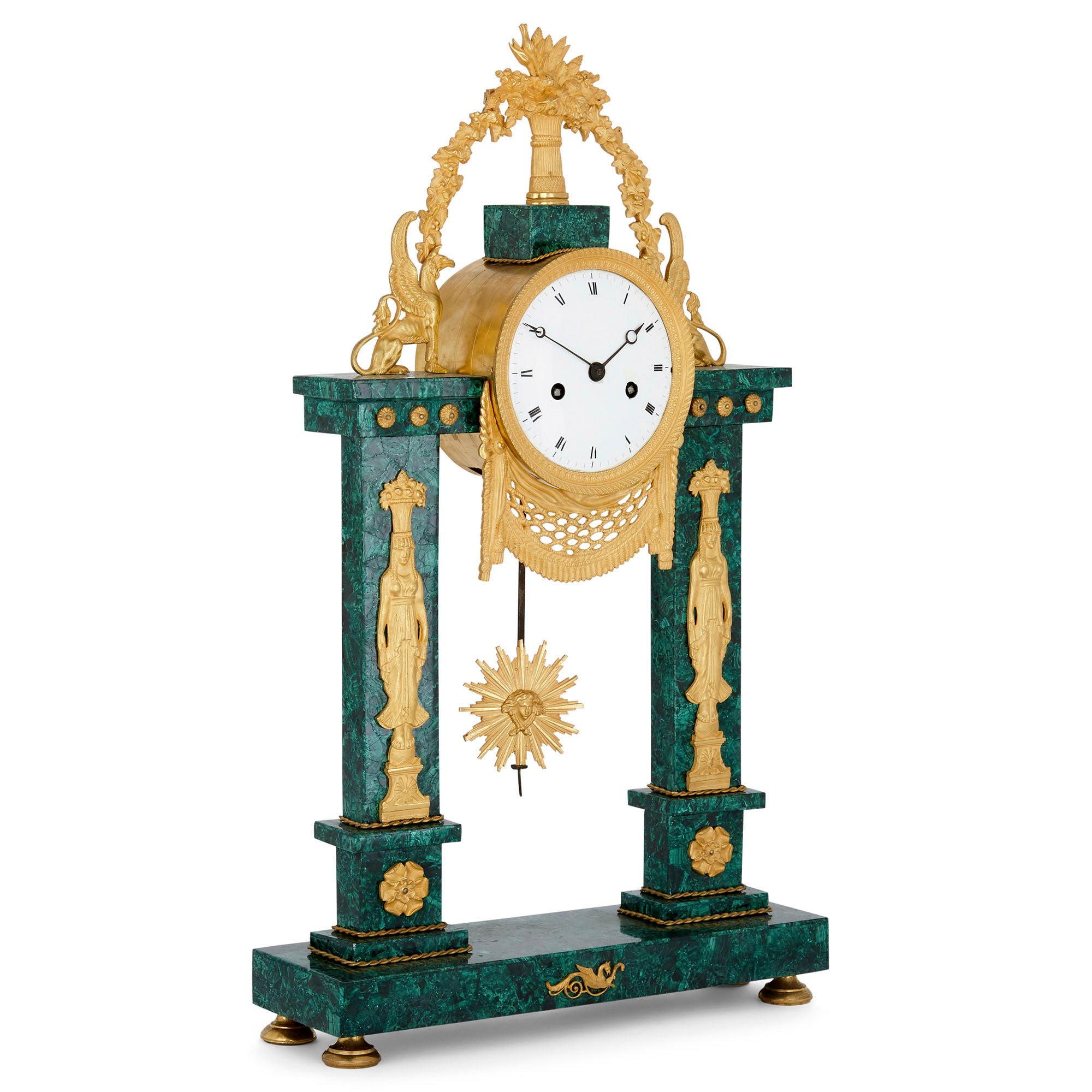 Neoclassical Louis XVI period French mantel clock
French, late 18th century
Dimensions: Height 56cm, width 33cm, depth 9.5cm

Crafted from ormolu and a later malachite veneer, this refined Louis XVI period mantel clock is designed in a