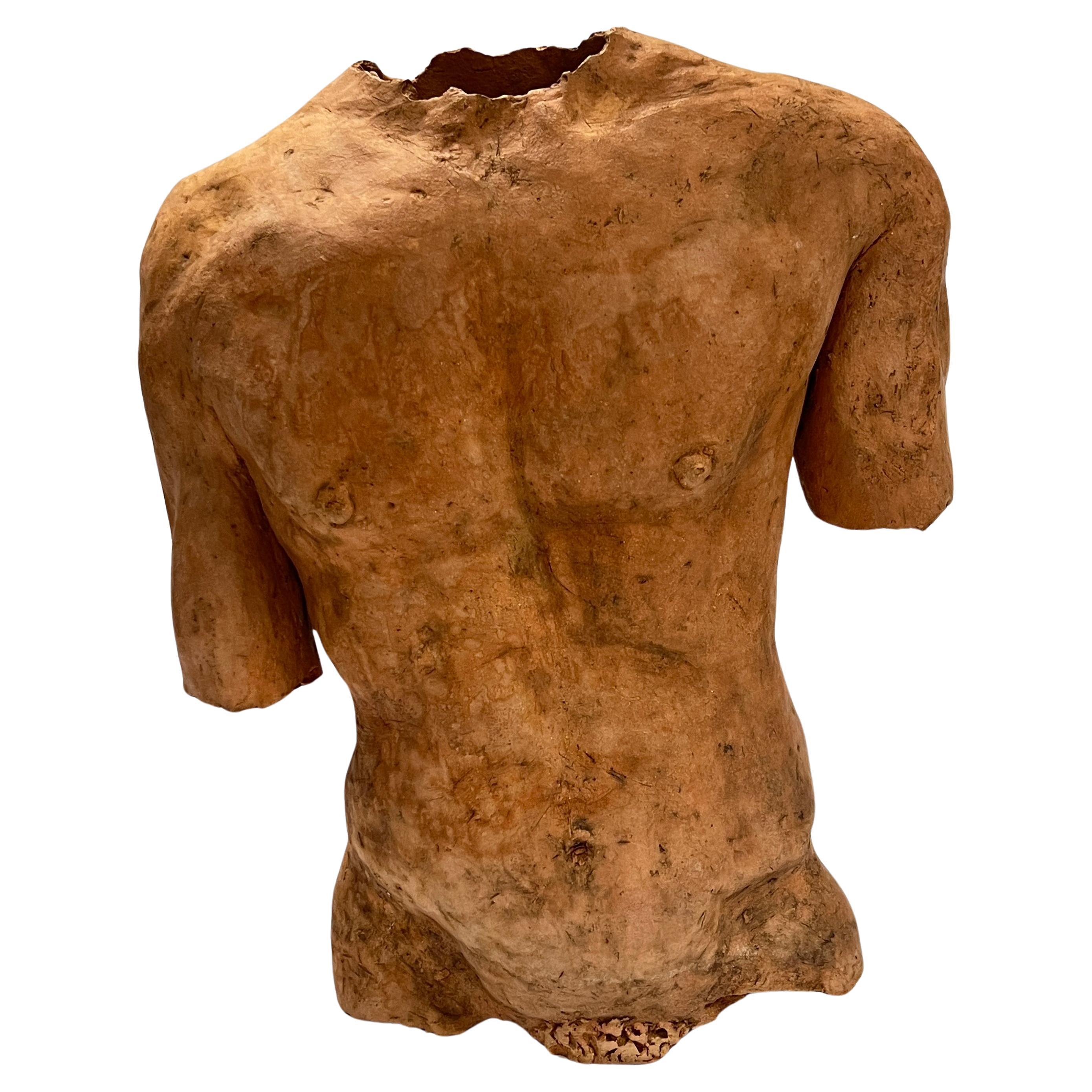 Torso masculino neoclásico según el antiguo en terracota