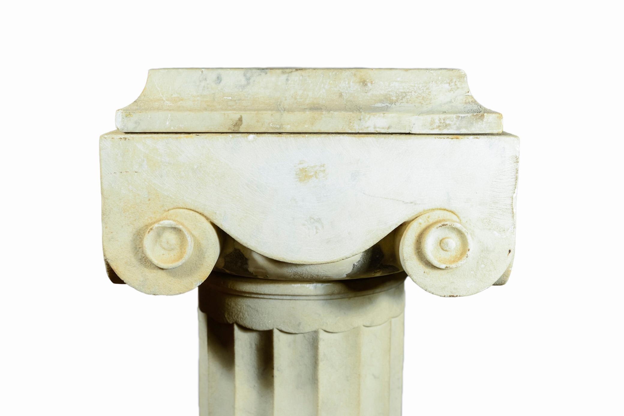 Neoclassical marble column,
Ionic column with fluted barrel, circa 1880, France
Measures: Width 29 cm, depth 29 cm, height 115 cm.