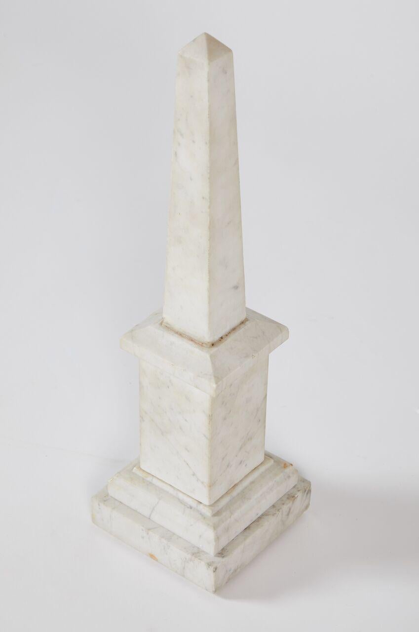 Neoclassical marble obelisk of geometric form would make a bold addition to any collection of treasures. This piece would integrate wonderfully in classic to contemporary interiors.
   