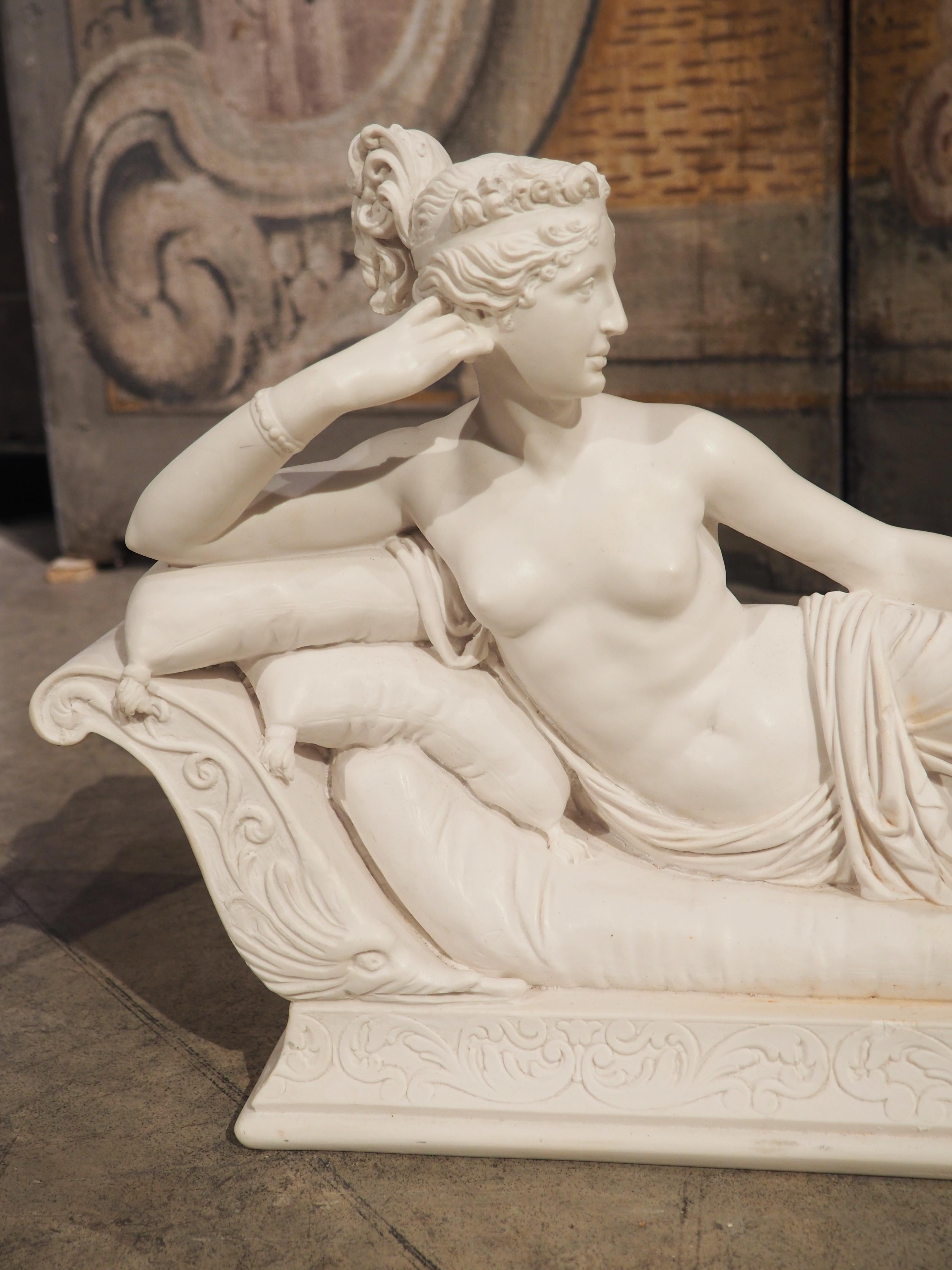 After the early 19th century original life-size white marble sculpture by Antonio Canova, this Neoclassical style marble sculpture is by Amilcare Santini (signed on the back side). The famous sculpture portrays a semi-nude Pauline Bonaparte (younger