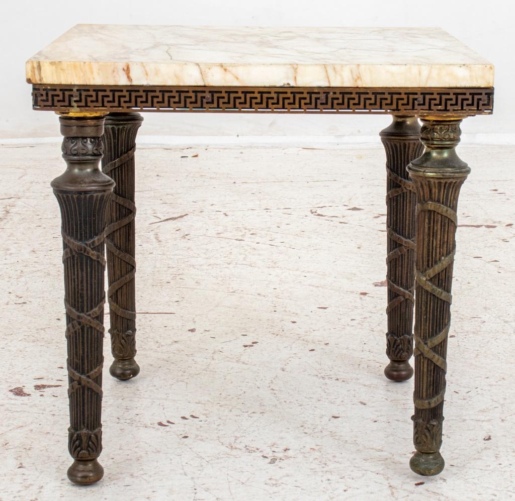 Neoclassical Marble Topped Occasional Table, the square top above stop-fluted quiver-form reeded tapering columnar legs. 

Dimensions: 16