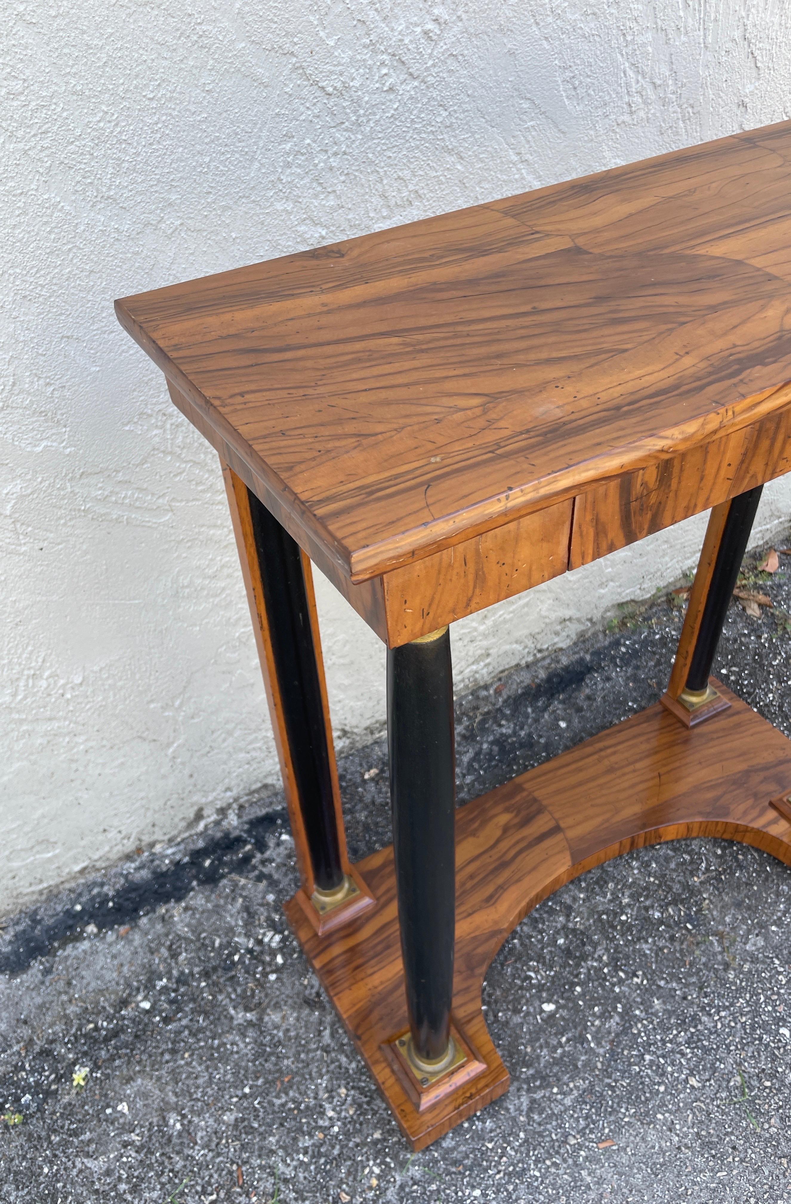 Lovely small Italian olivewood console / side table with one drawer.
