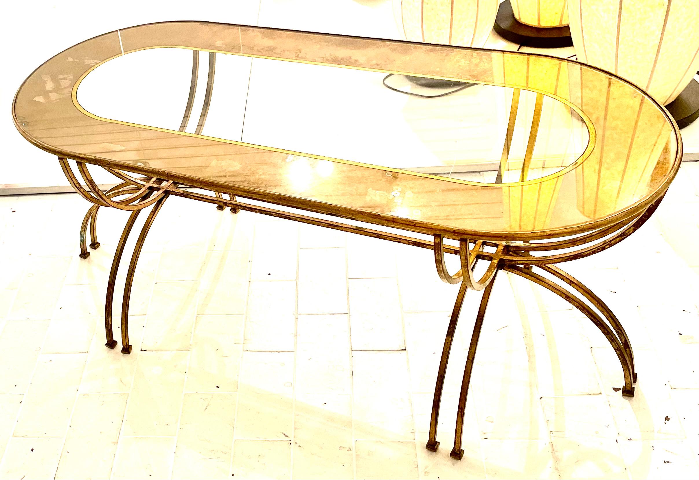 Mid-20th Century Neoclassical Oval Gilded Wrought Iron Low Table With Eglomise Top, France 1950.