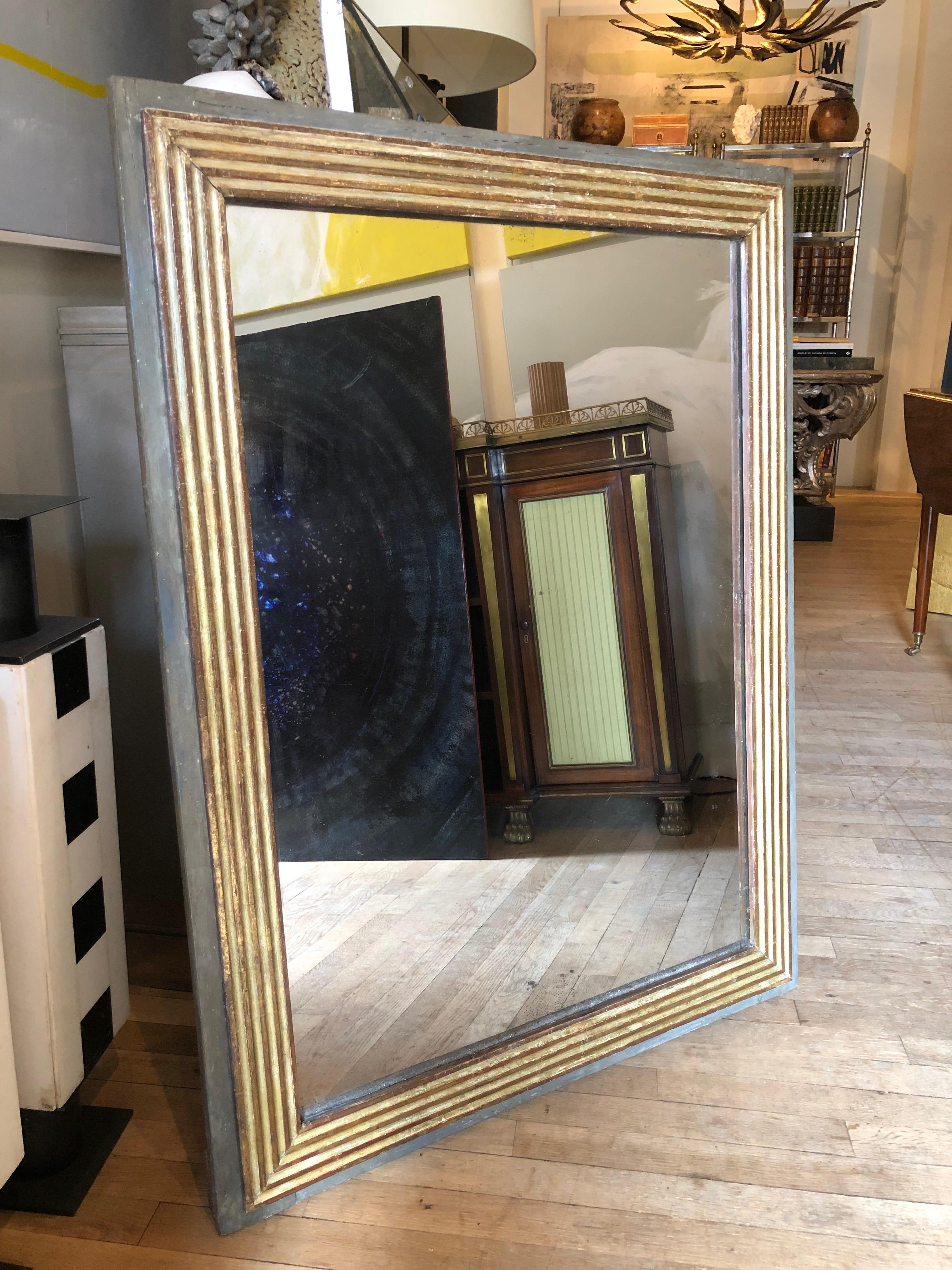 Neoclassical painted and gilded mirror
French or Italian, circa 1800
Measures: 43 ¼ x 33 inches.

[2185].