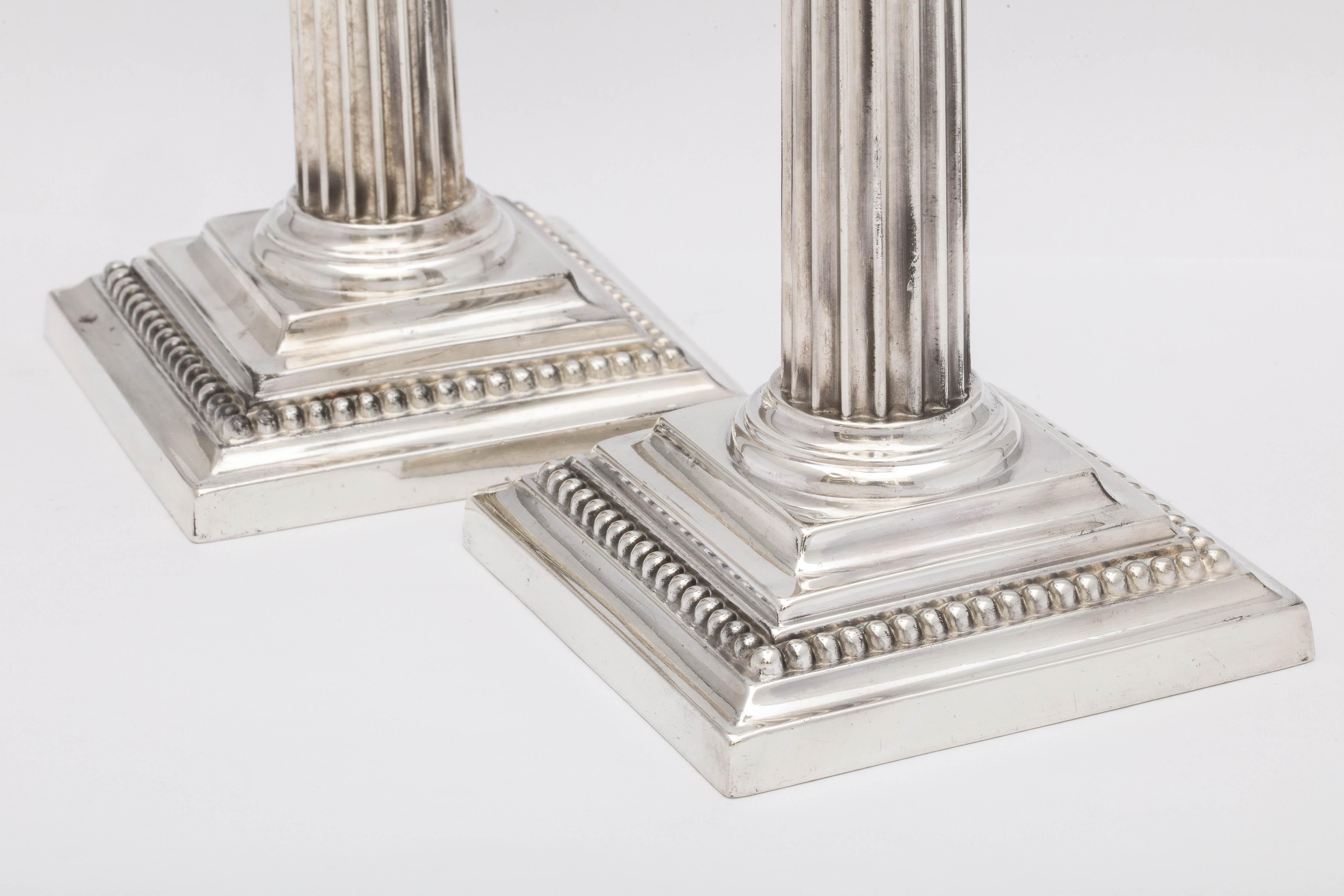 Early 20th Century Neoclassical Pair of Sterling Silver Corinthian Column Candlesticks by Gorham