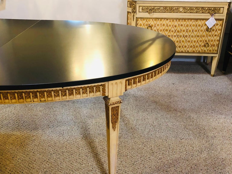 Neoclassical ParcelGilt and Paint Decorated Dining Table with Ebony