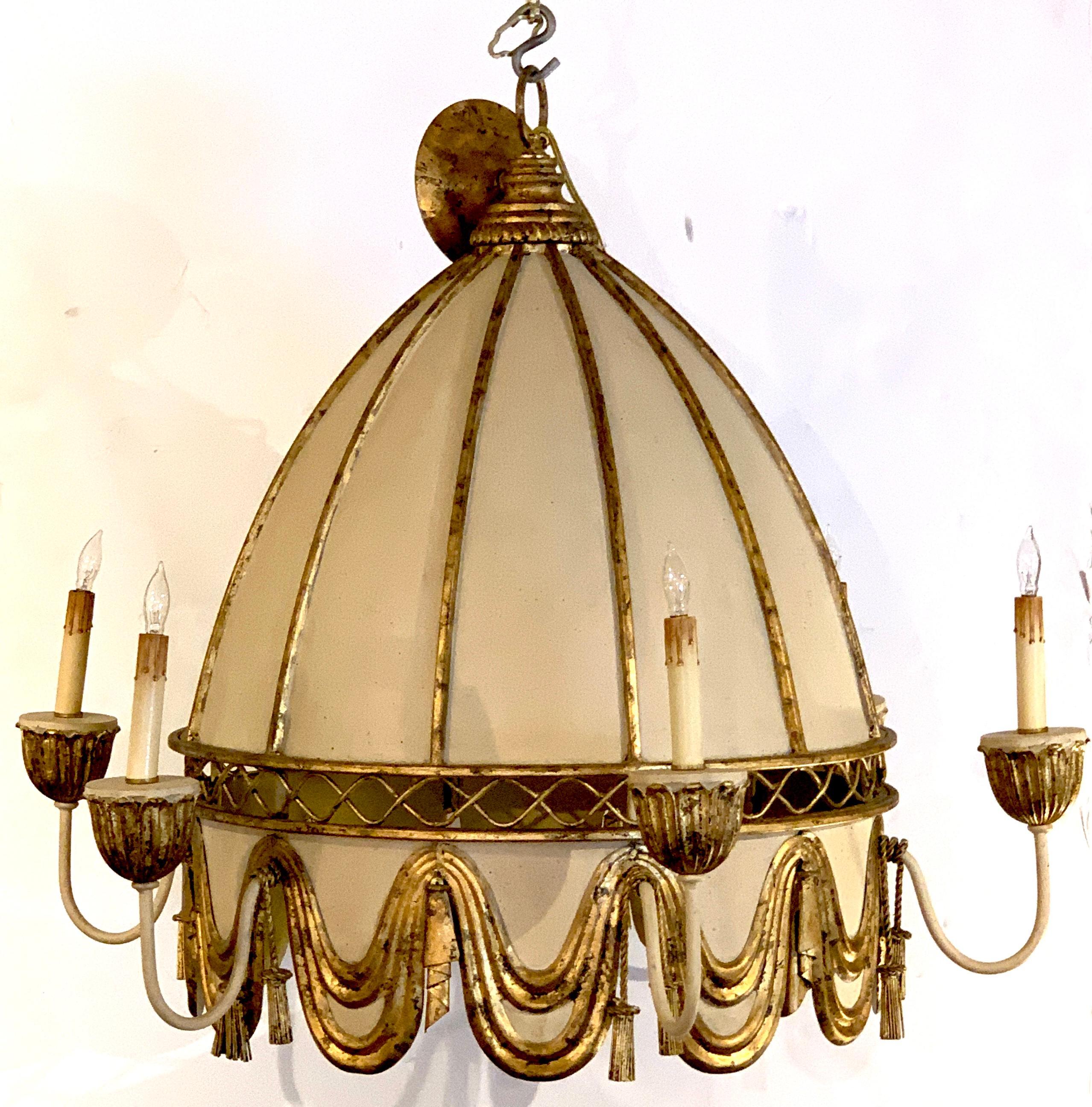 Polychromed tole pagoda style chandelier, with pierced dome top fitted with eight-light
The interior has a diameter of 23