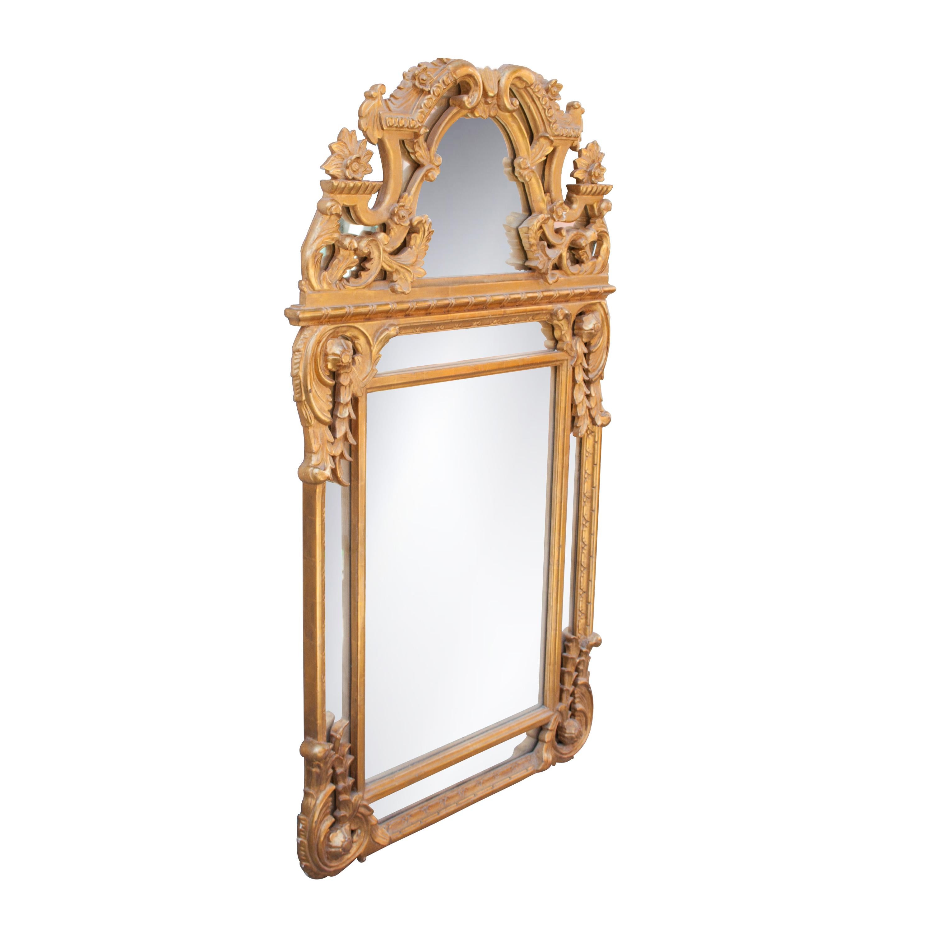 Neoclassical rectangular handcrafted mirror. Hand carved wooden structure with gold foil finished. Spain, 1970.