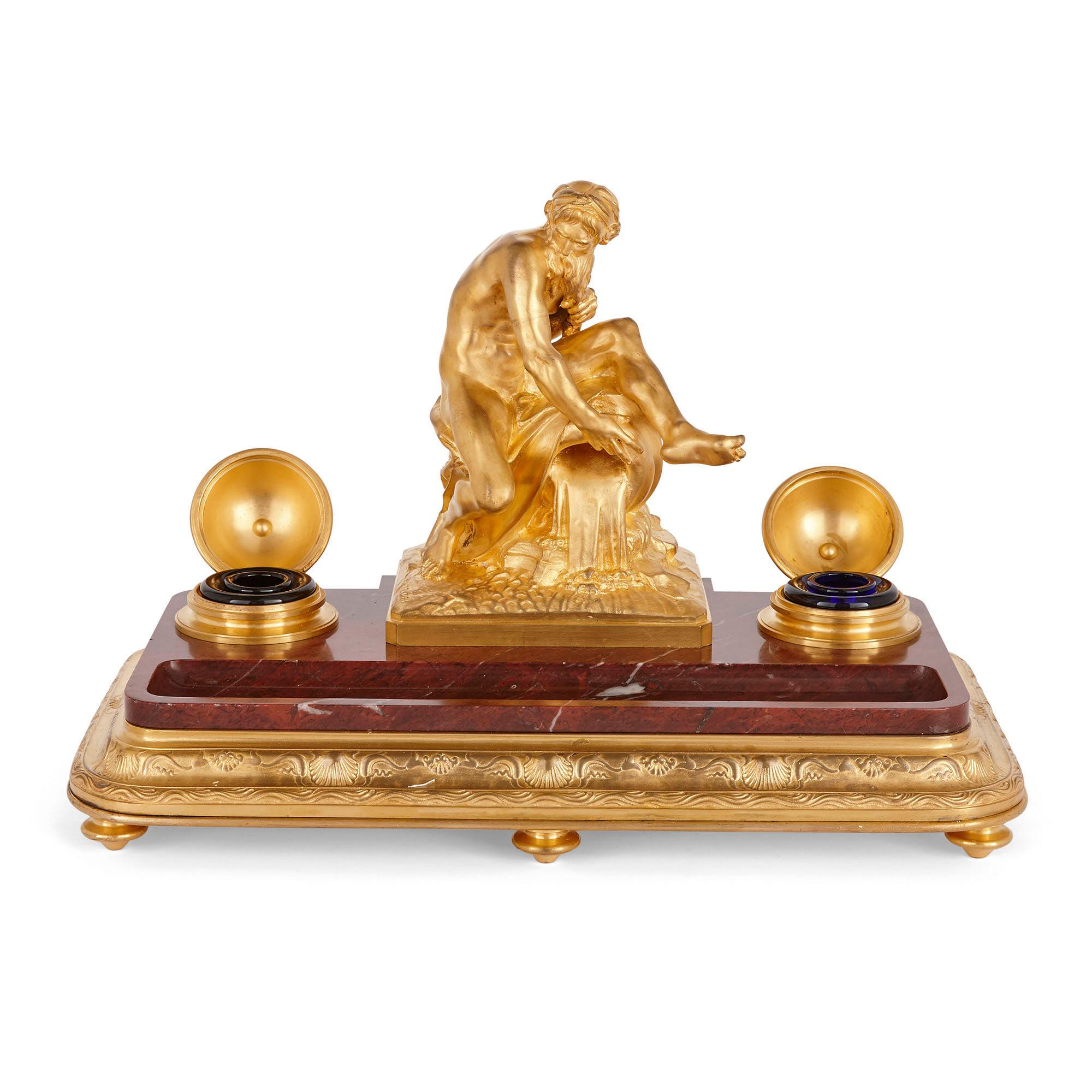 Neoclassical griotte marble and gilt bronze ink stand by Barbedienne
French, 19th century
Size: Height 25cm, width 36cm, 21cm

This magnificent inkstand is by Ferdinand Barbedienne, one of the leading metalworkers working in France during the
