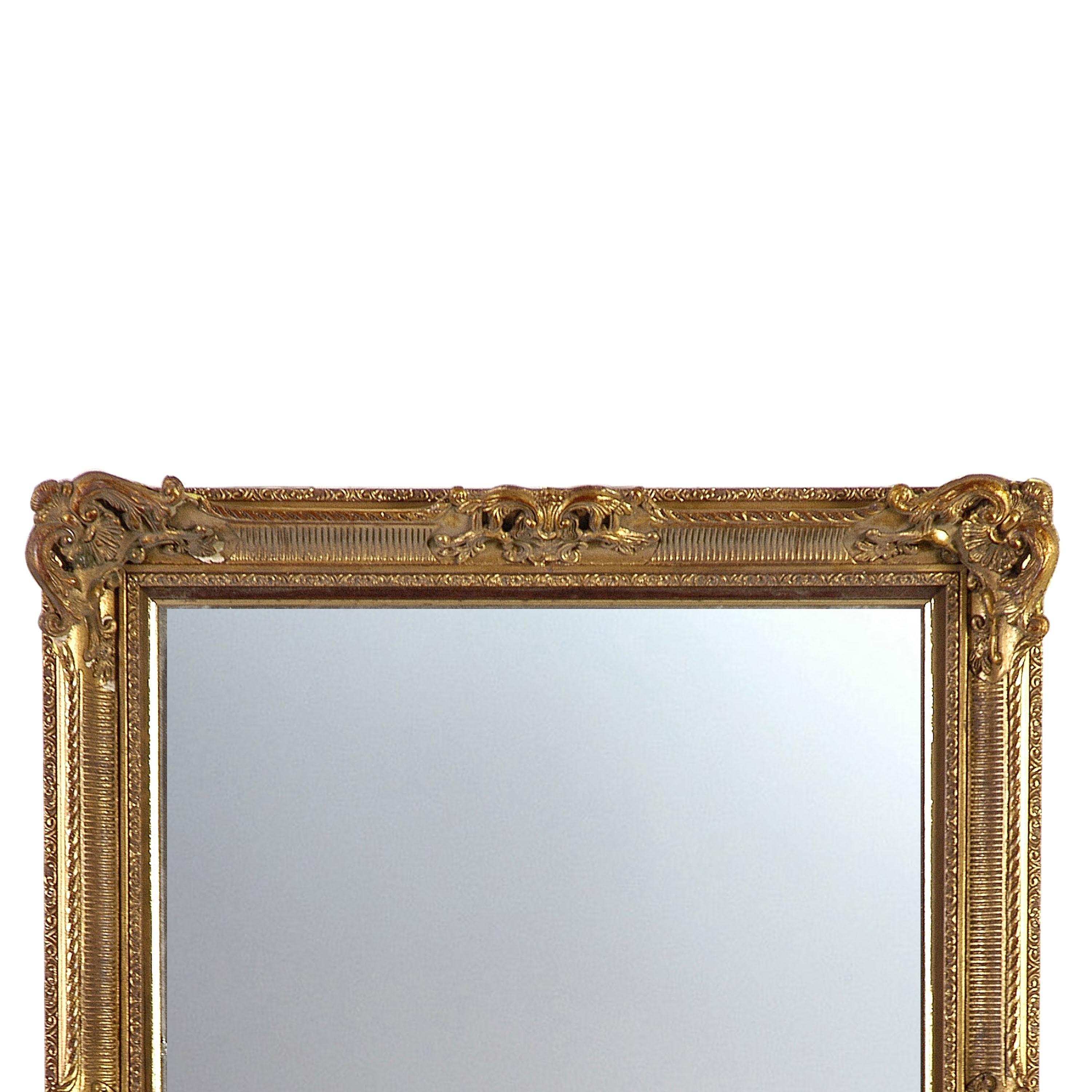 Neoclassical Regency style handcrafted mirror. Rectangular hand carved wooden structure with gold foiled finish, Spain, 1970.