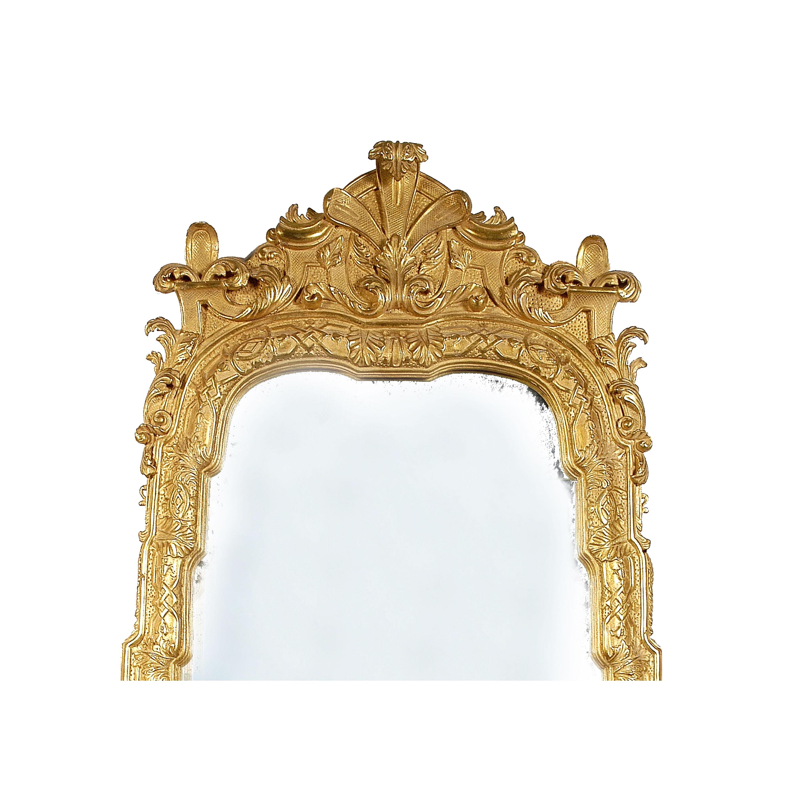 Neoclassical Regency style handcrafted mirror. Rectangular hand carved wooden structure with gold foiled finish.
Spain, 1970.